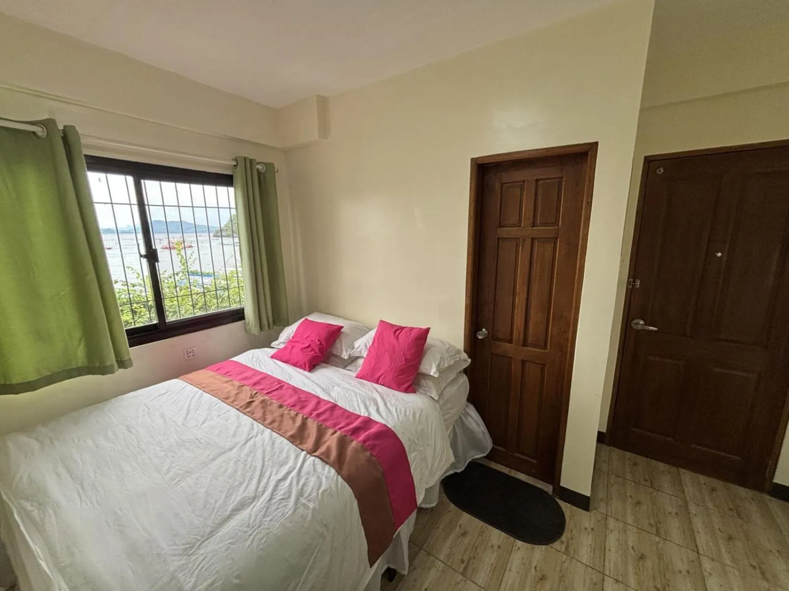 Bed in Pink Ocean Diving Resort Sabang Puerto Galera