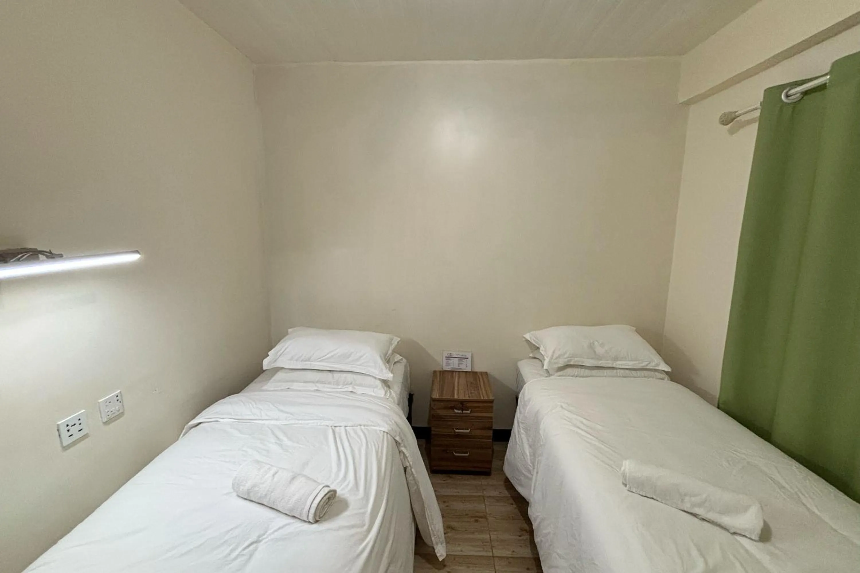 Bed in Pink Ocean Diving Resort Sabang Puerto Galera