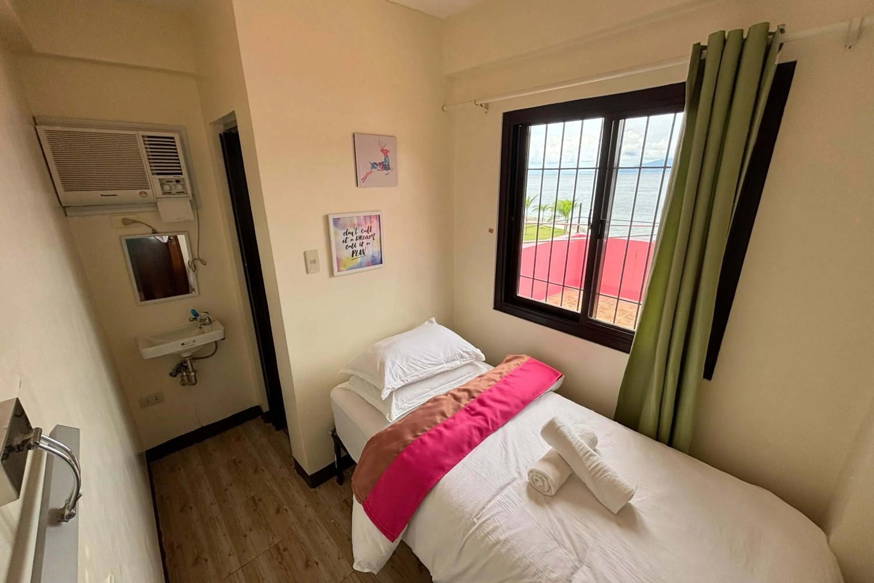 Bed in Pink Ocean Diving Resort Sabang Puerto Galera