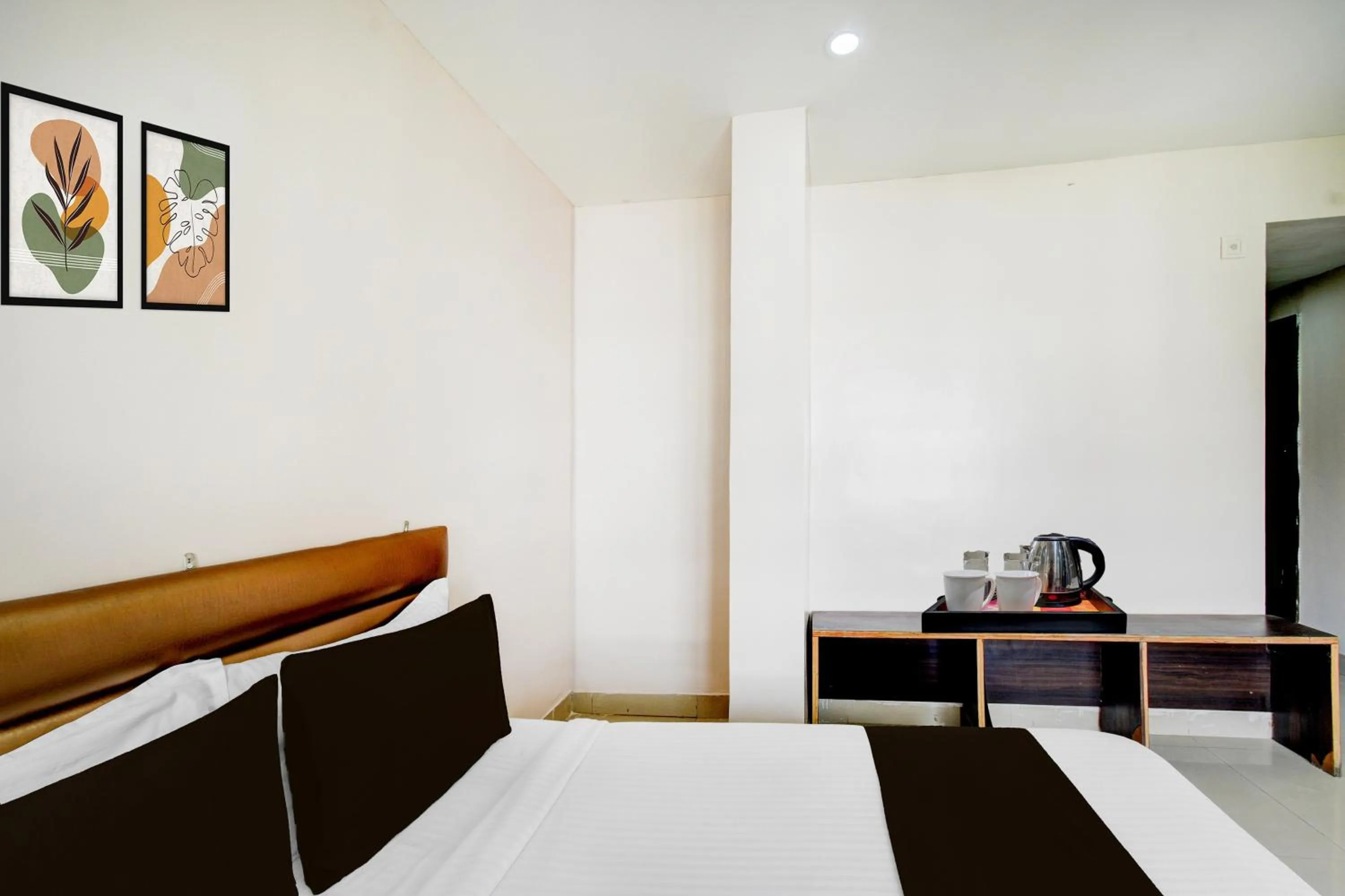 Bedroom, Bed in Townhouse Narayanaguda Metro Station Formerly Hotel Anshu Grand