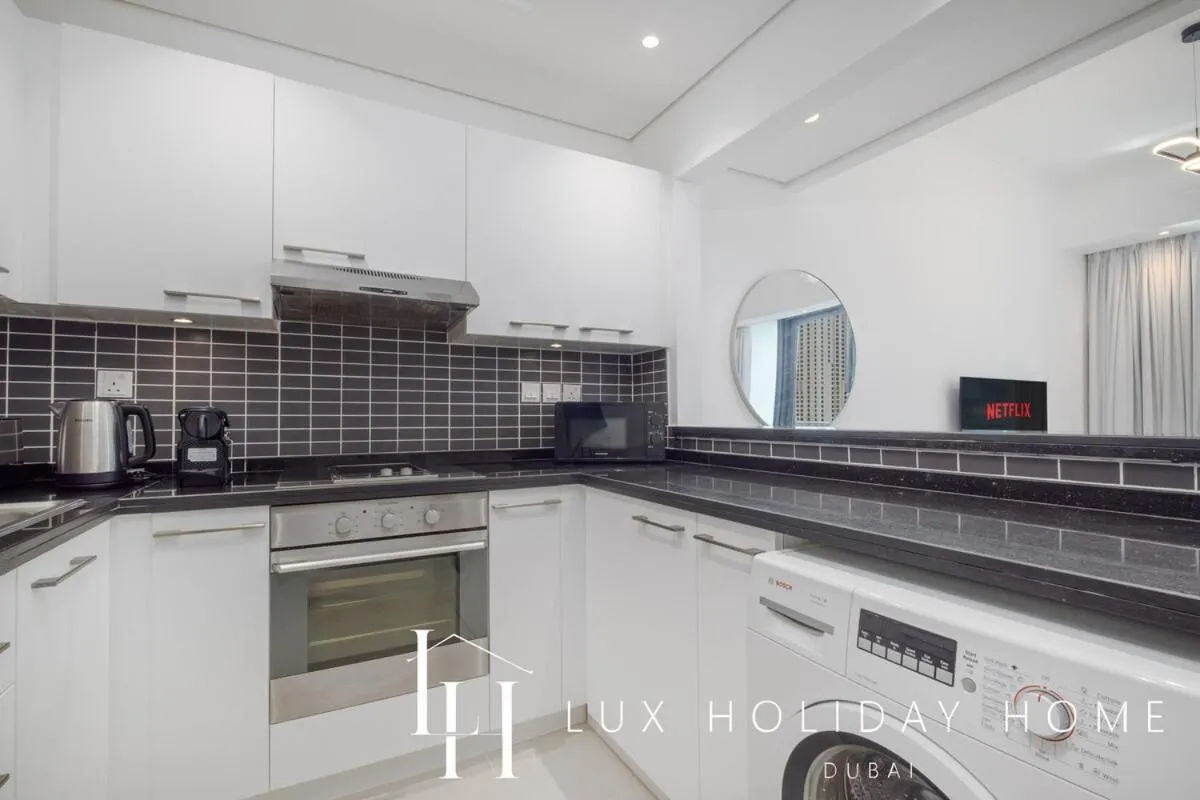 Kitchen or kitchenette in LUX The Silverene Marina View Studio 2