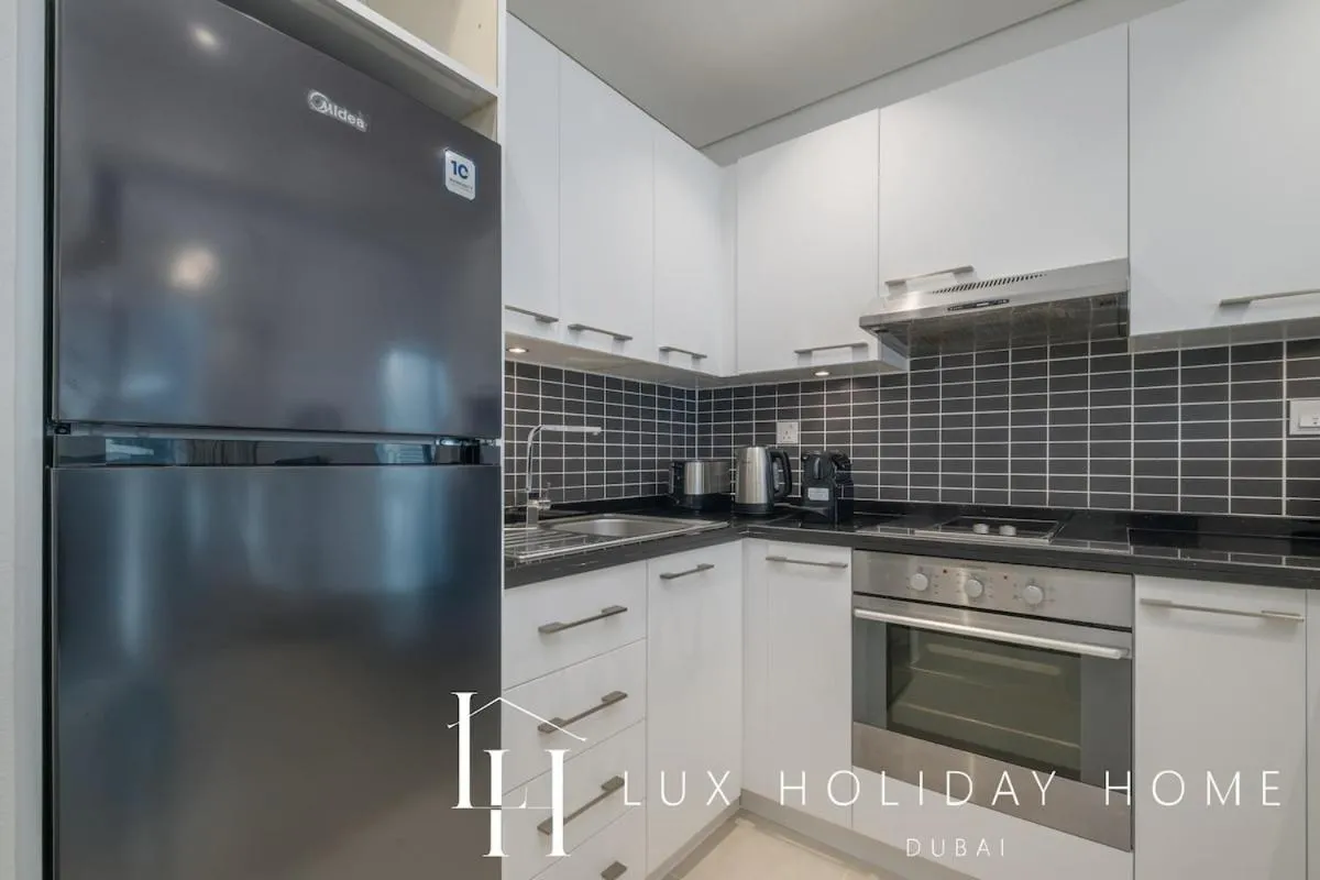 Kitchen or kitchenette in LUX The Silverene Marina View Studio 2