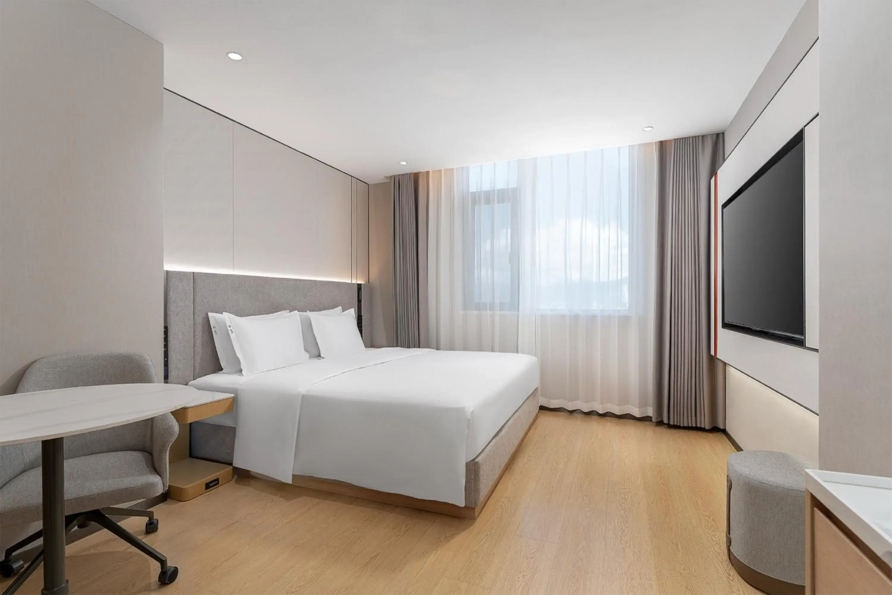 Bed in Holiday Inn Express Lijiang Ancient Town by IHG Bed in Holiday Inn Express Lijiang Ancient Town by IHG