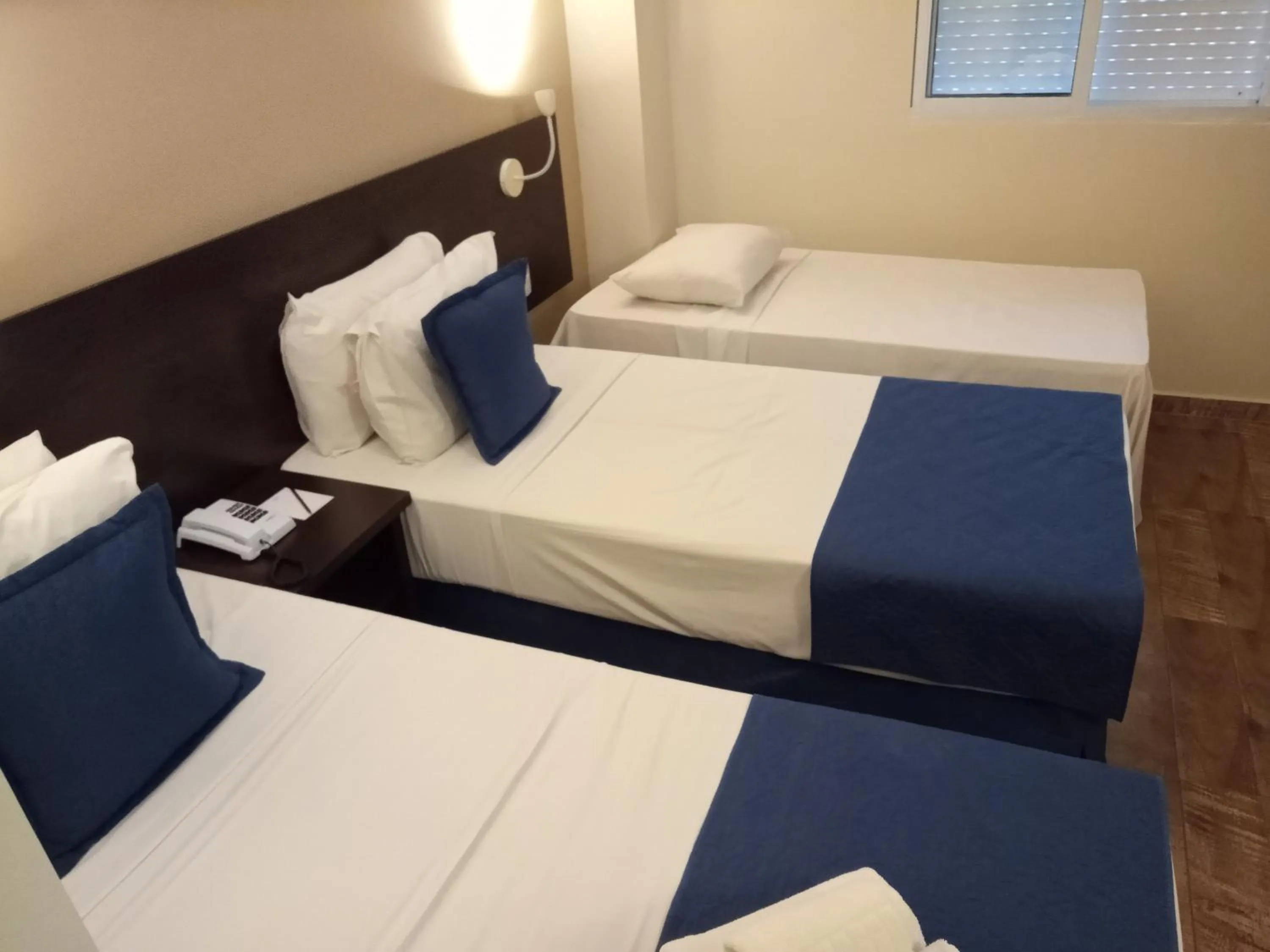 Bed in Hotel Rexton