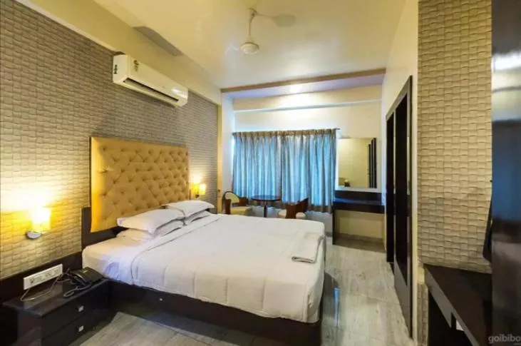 Photo of the whole room, Bed in Hotel Vaishnavi
