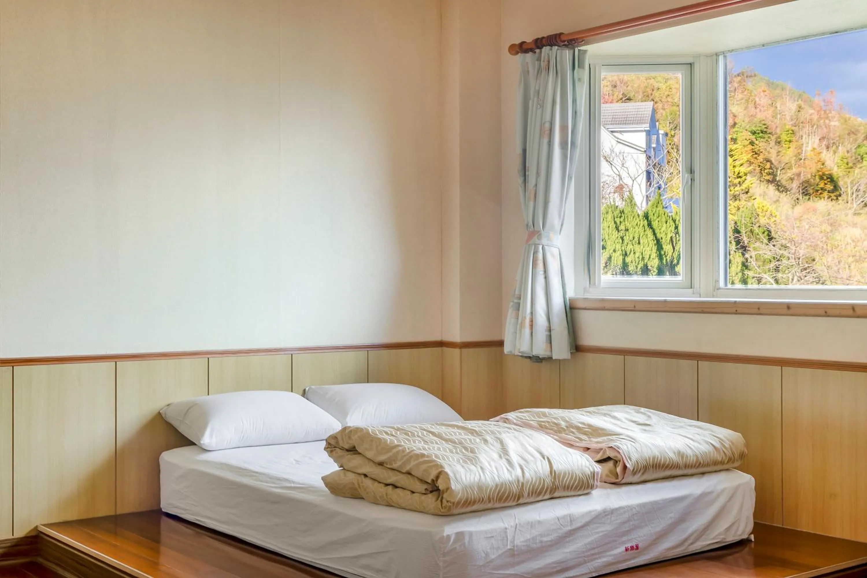 Bed in Chingjing New Paradise B&B