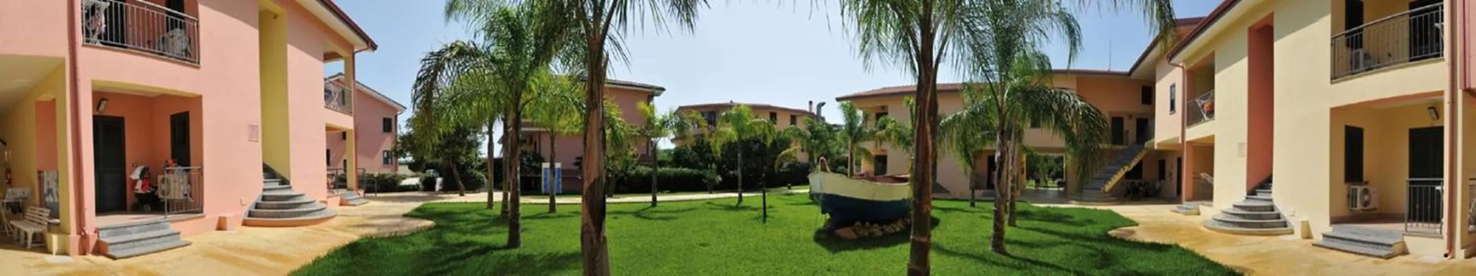 Garden view in Villaggio & Residence Club Aquilia