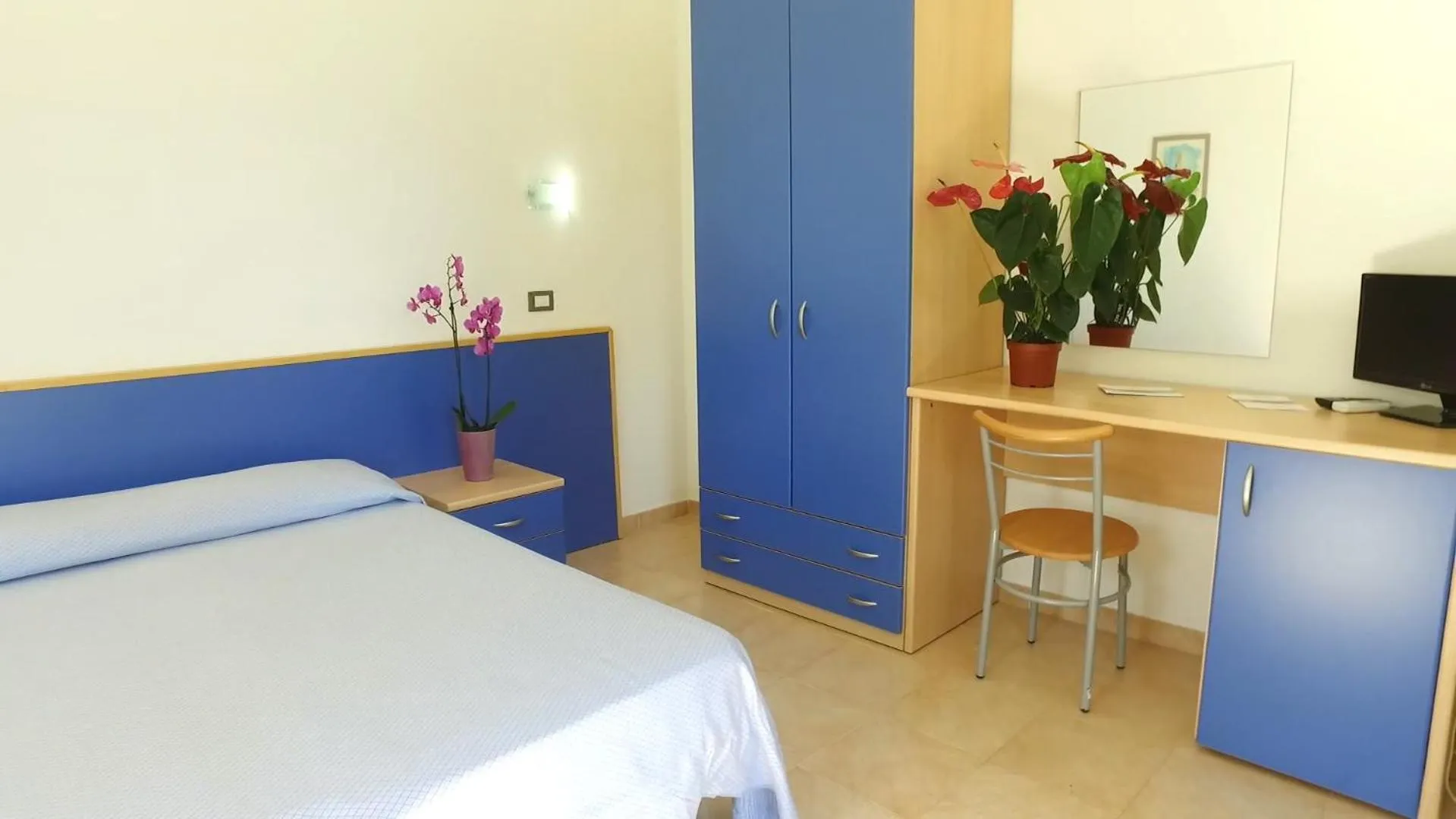 Bedroom in Villaggio & Residence Club Aquilia