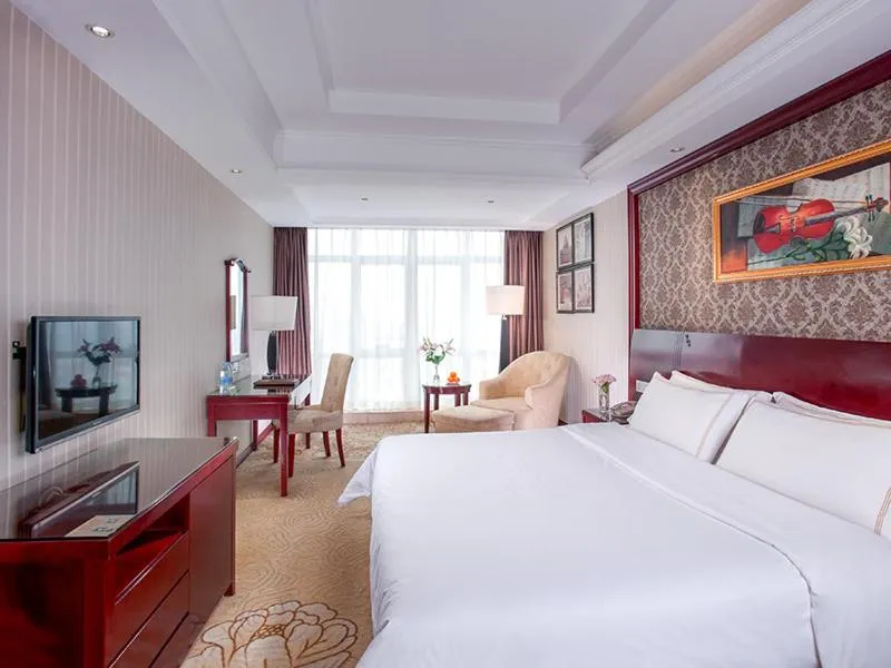 Bed in Vienna Hotel Xinyu Kaiguang