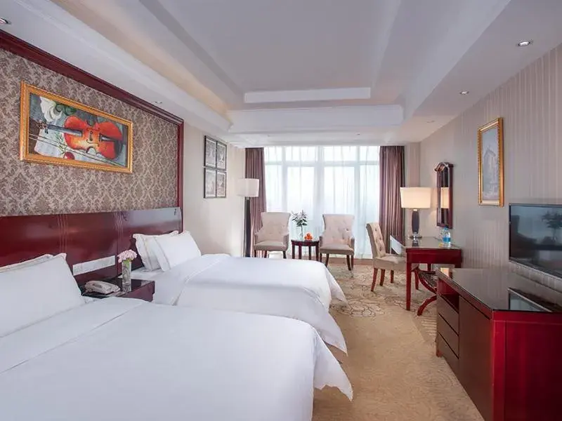 Bed in Vienna Hotel Xinyu Kaiguang Bed in Vienna Hotel Xinyu Kaiguang