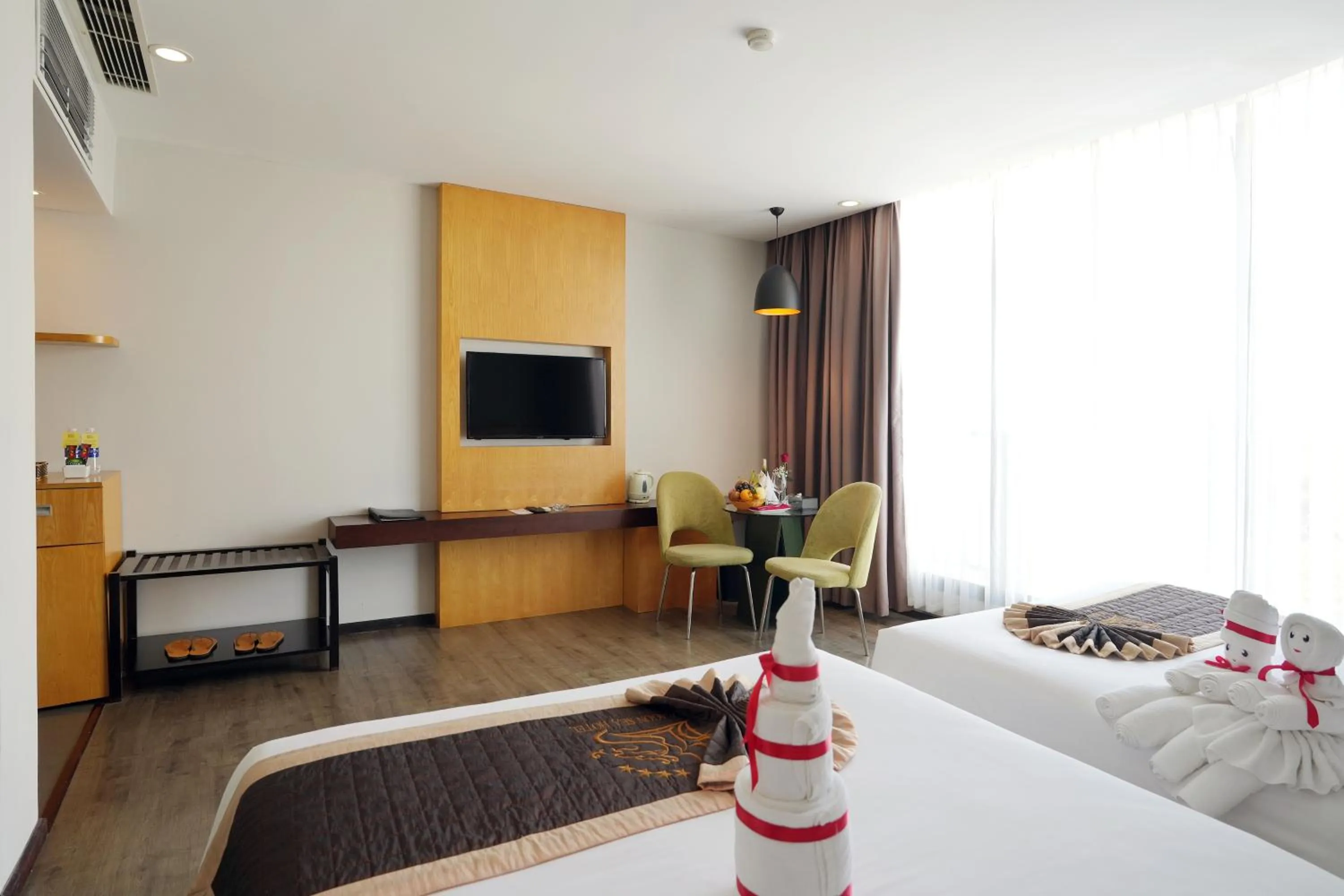 Bed in Dragon Sea Hotel