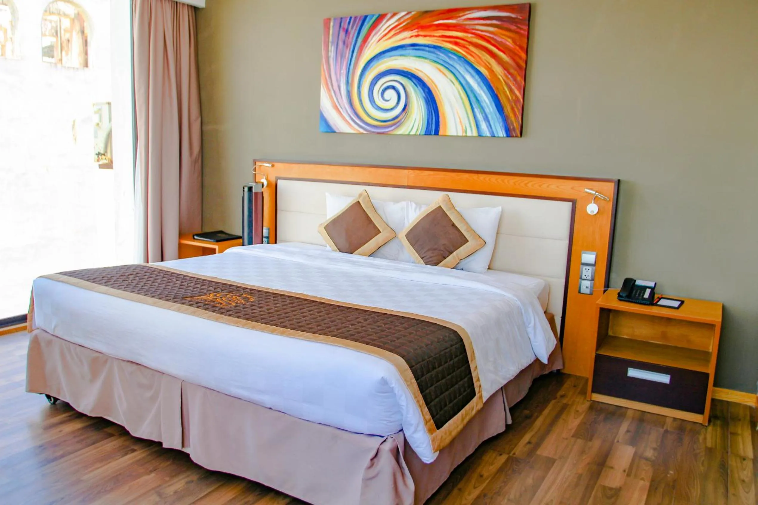 Bed in Dragon Sea Hotel