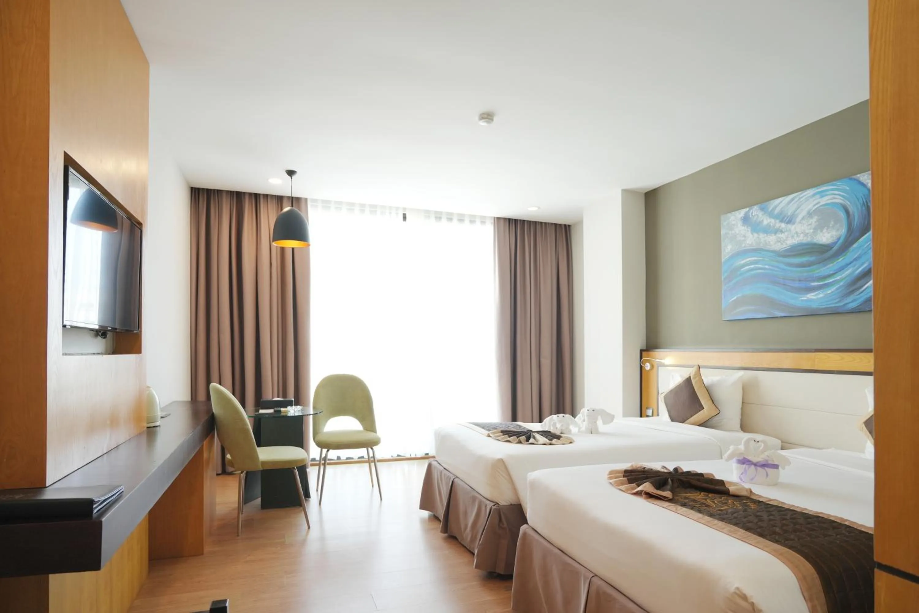 Bed in Dragon Sea Hotel