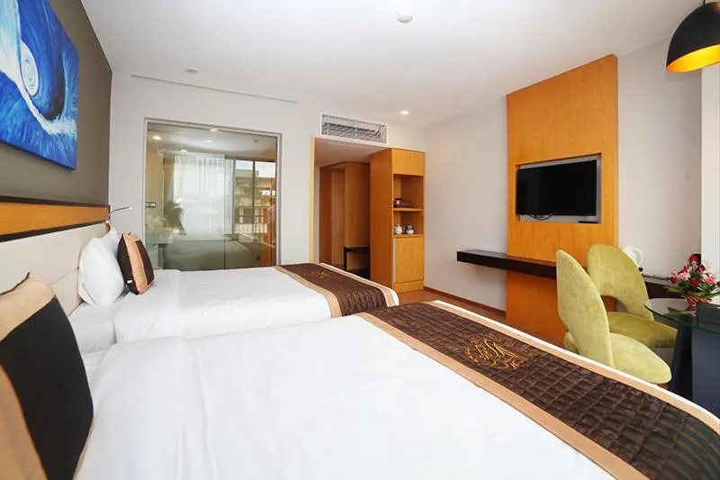 Bed in Dragon Sea Hotel