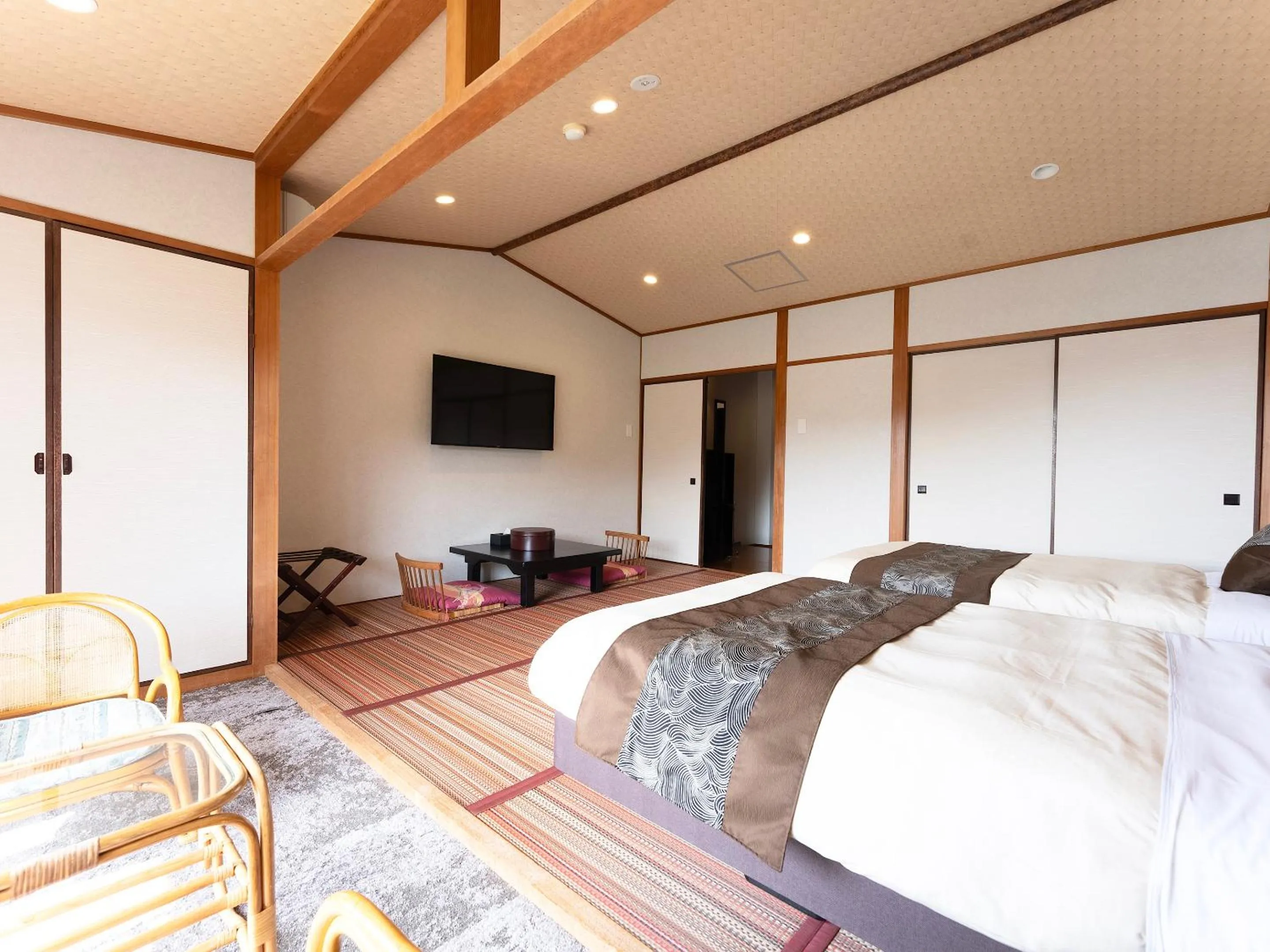 Bed in Livemax Resort Yuhigaura Kitu Onsen
