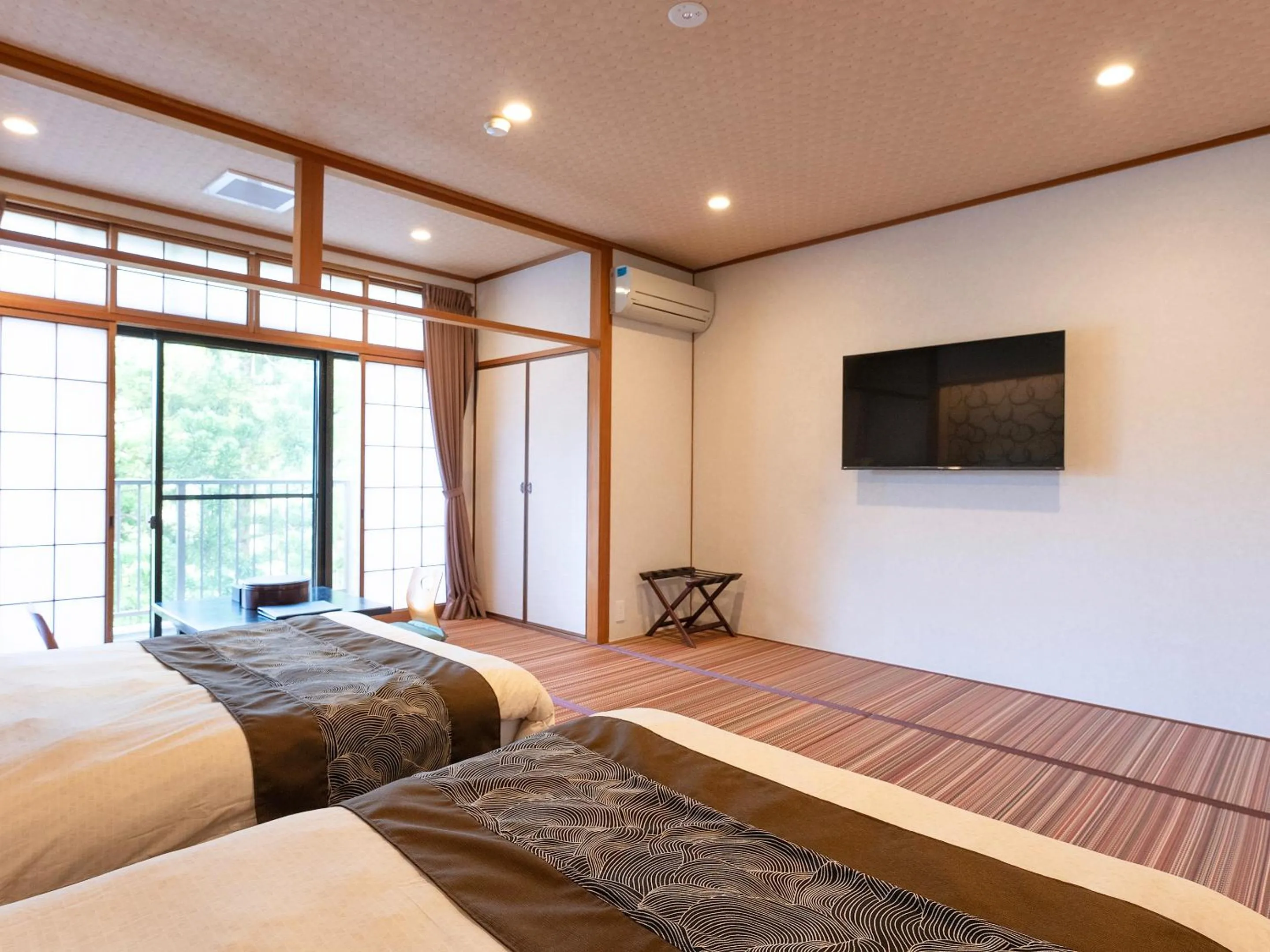 Bed in Livemax Resort Yuhigaura Kitu Onsen