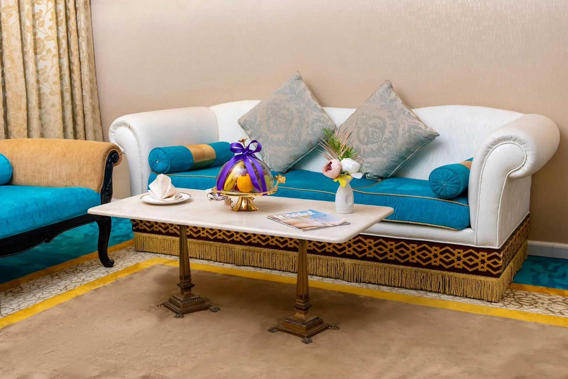 Living room in Saraya Corniche Hotel