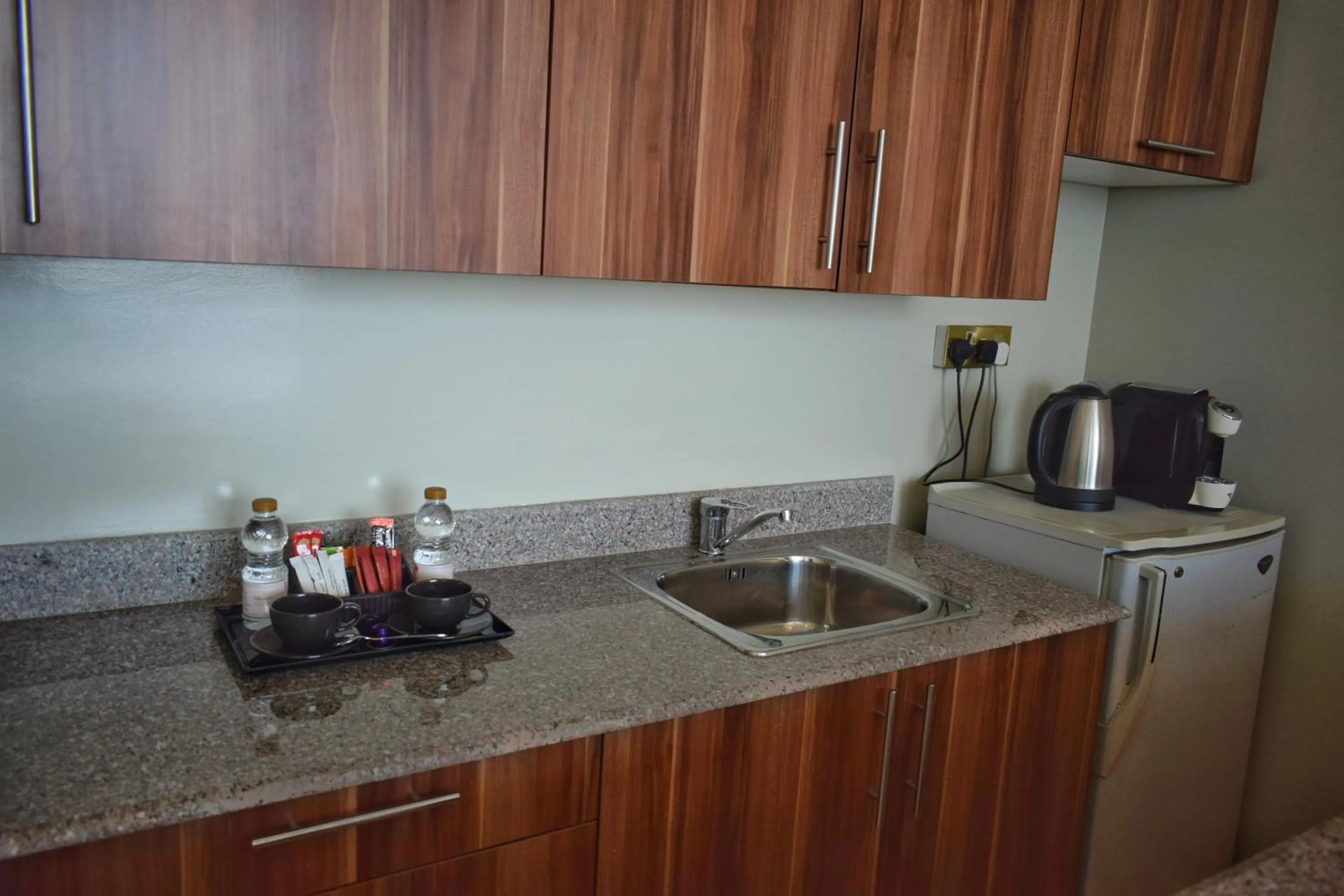 Kitchen or kitchenette in Saraya Corniche Hotel
