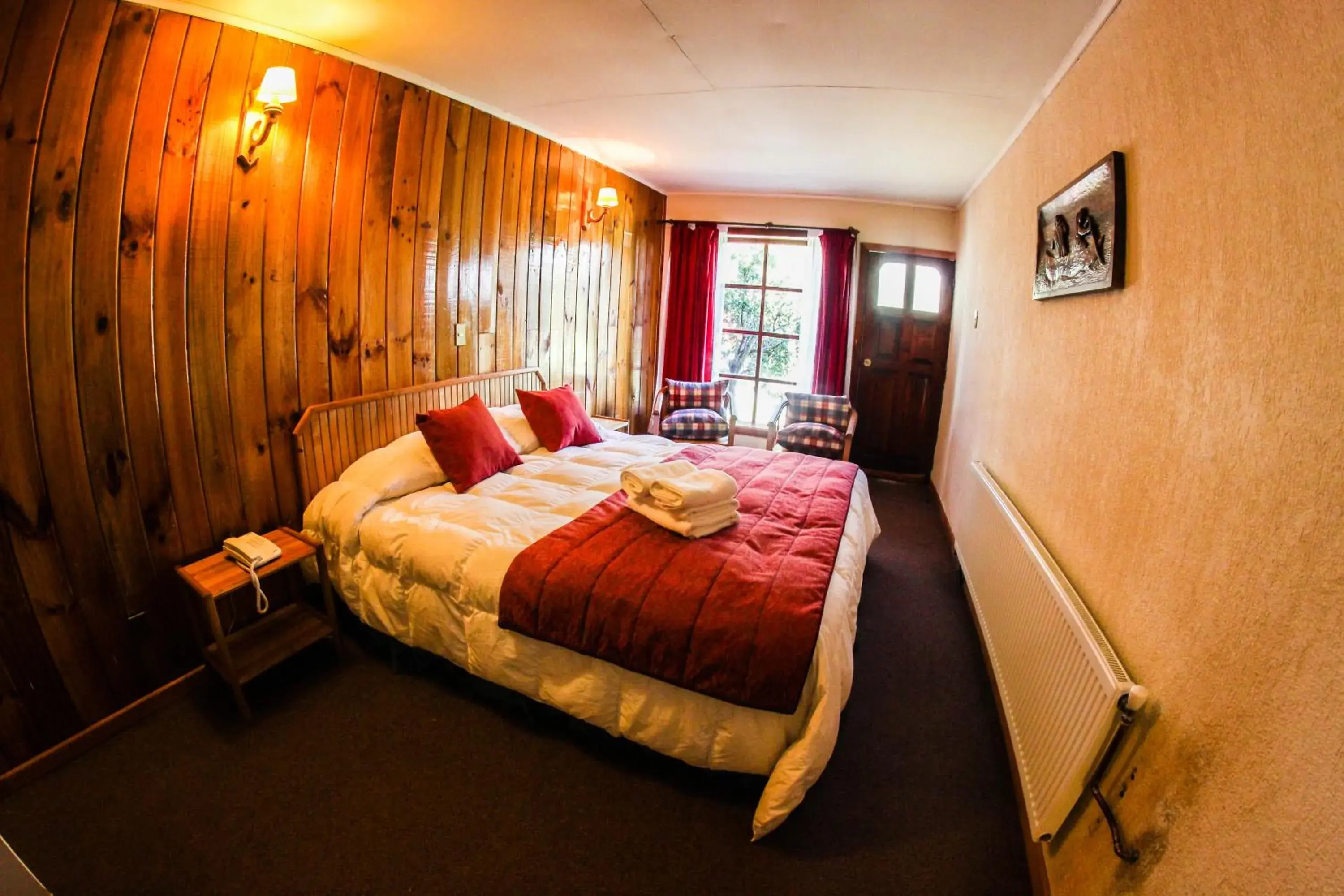 Bed in Hostería Pehoe Bed in Hostería Pehoe