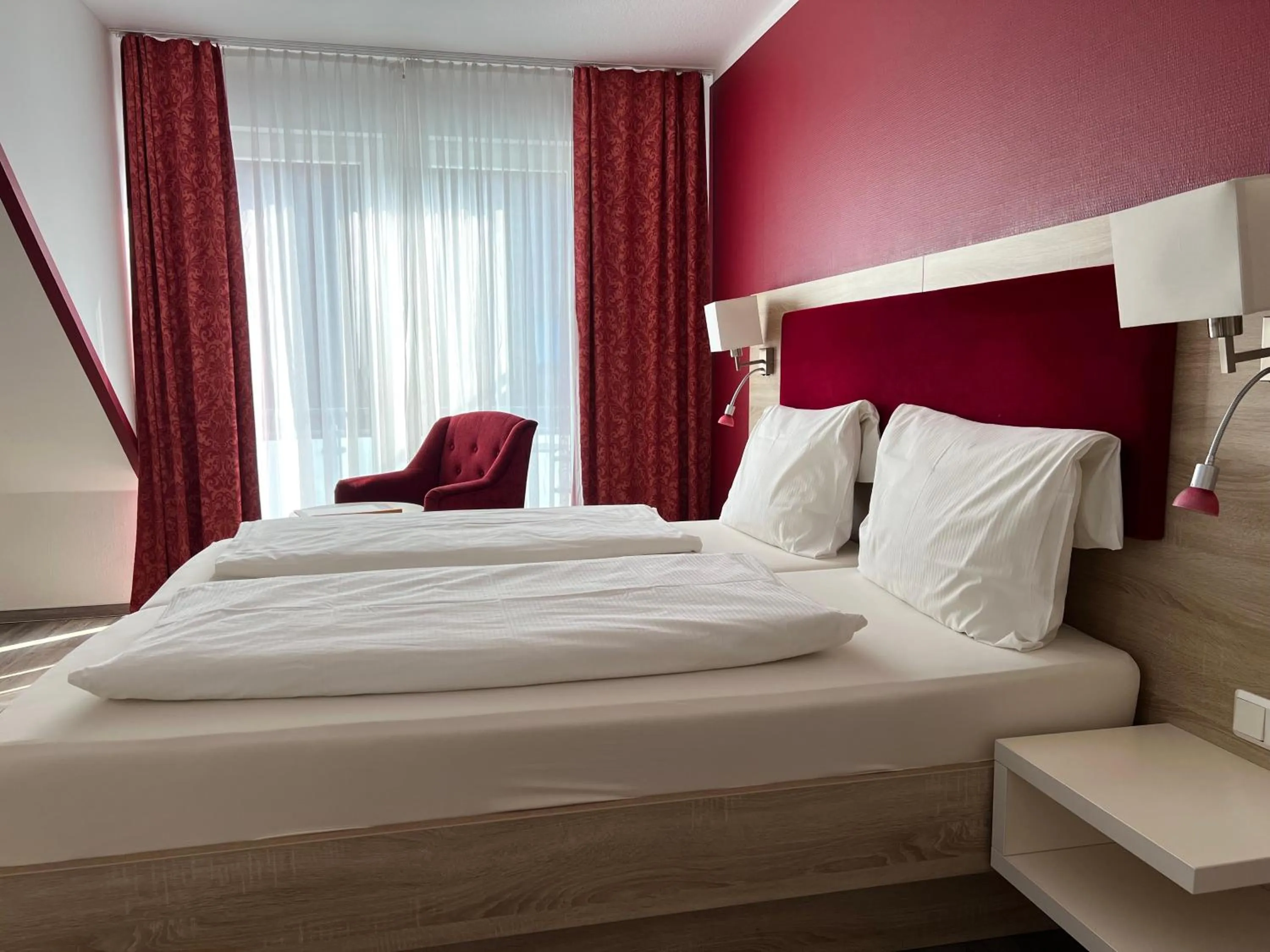 Bed in Hotel Sonne am Meer