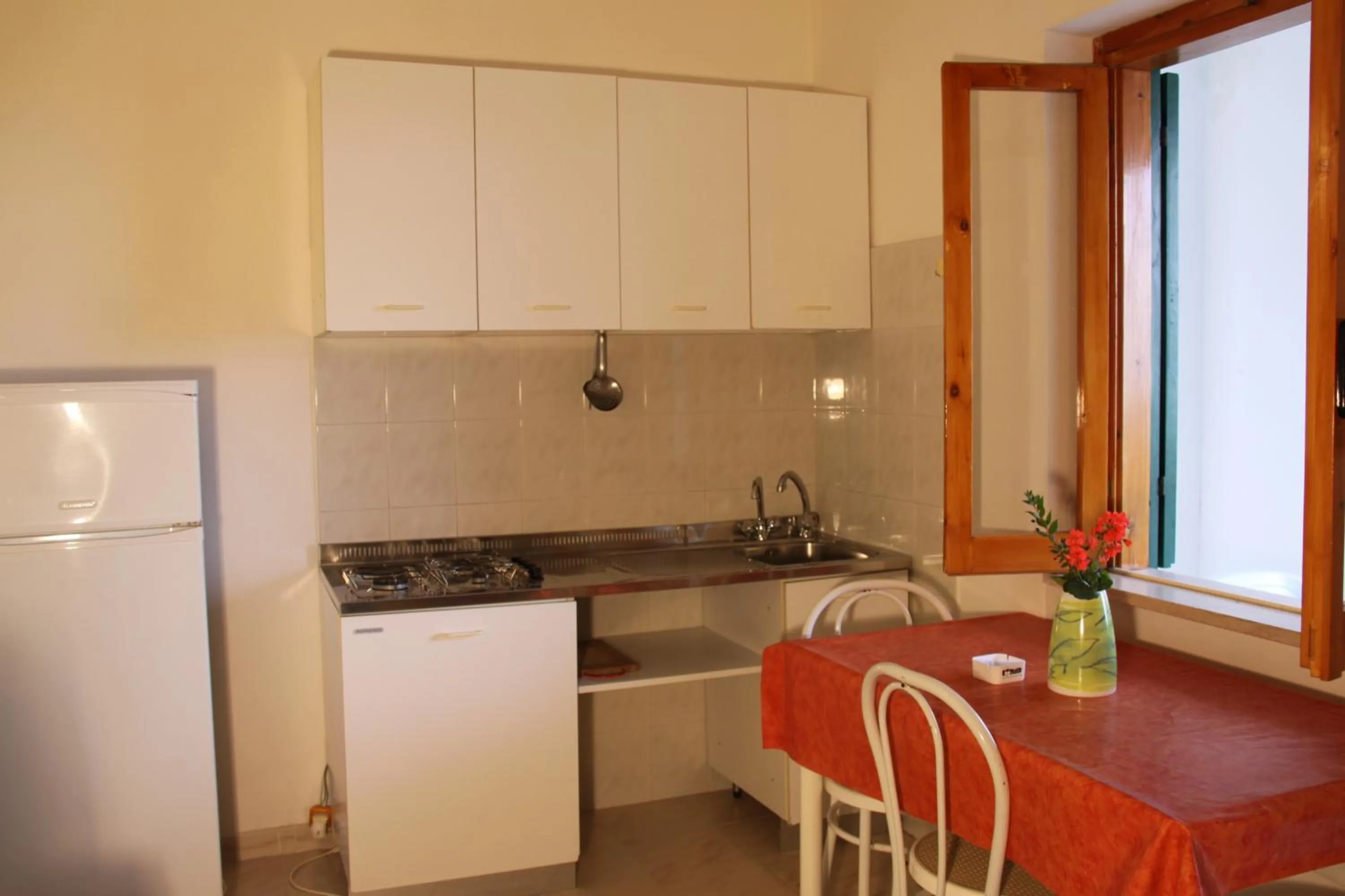 Kitchen or kitchenette in Residence Gli Stingi