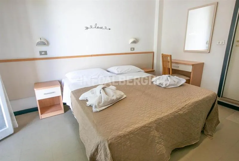 Bed in Hotel Paradiso