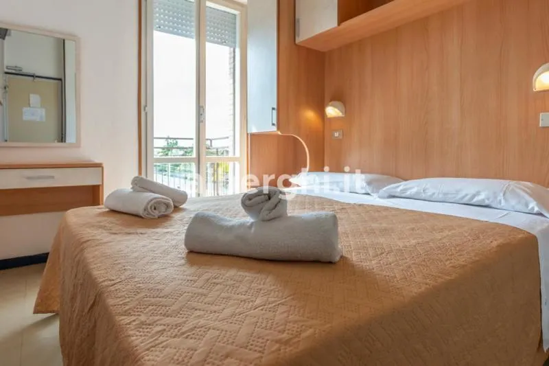 Bed in Hotel Paradiso