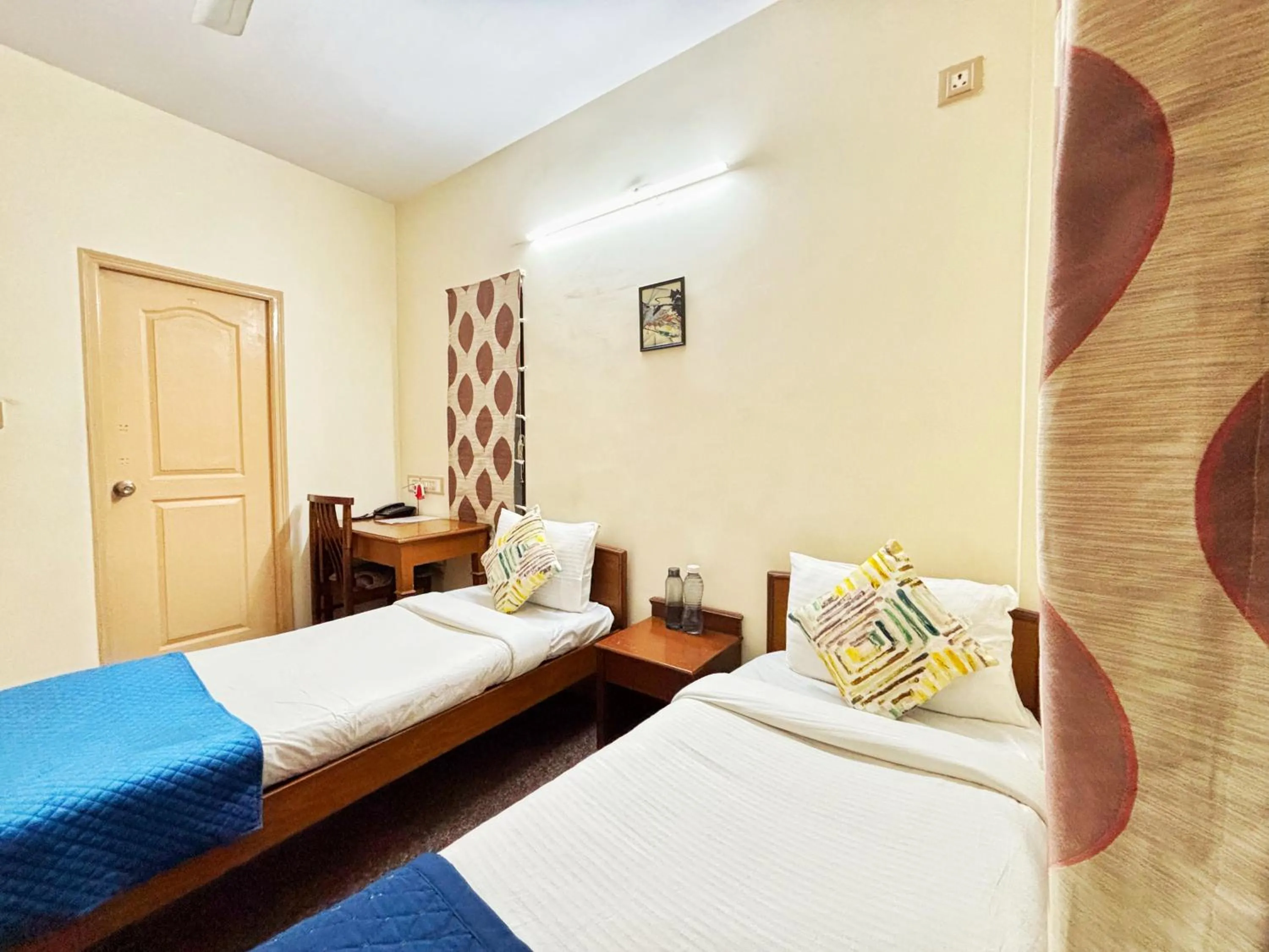 Bed in Mystic Felicity Inn