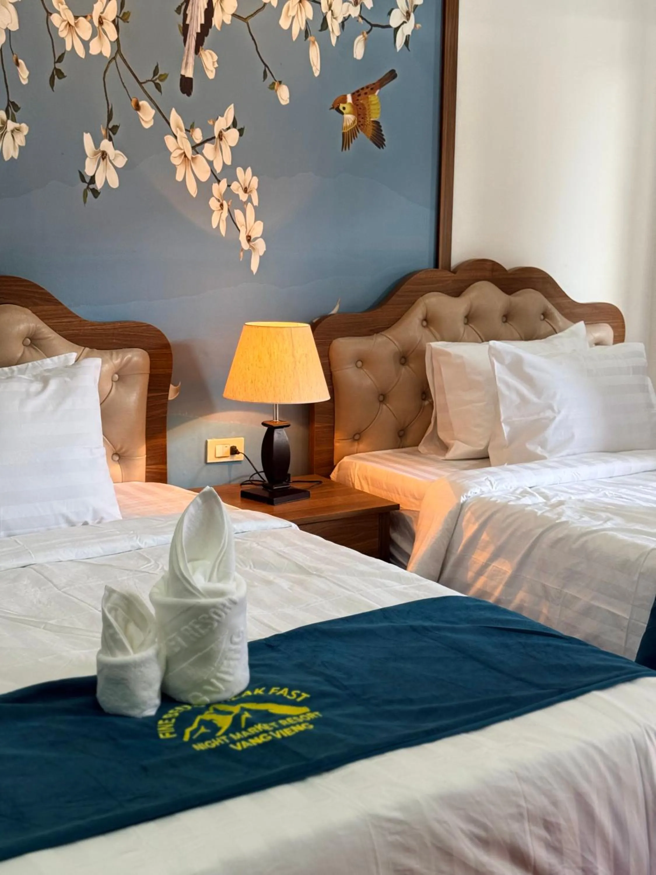 Bed in Vangvieng Night Market Resort