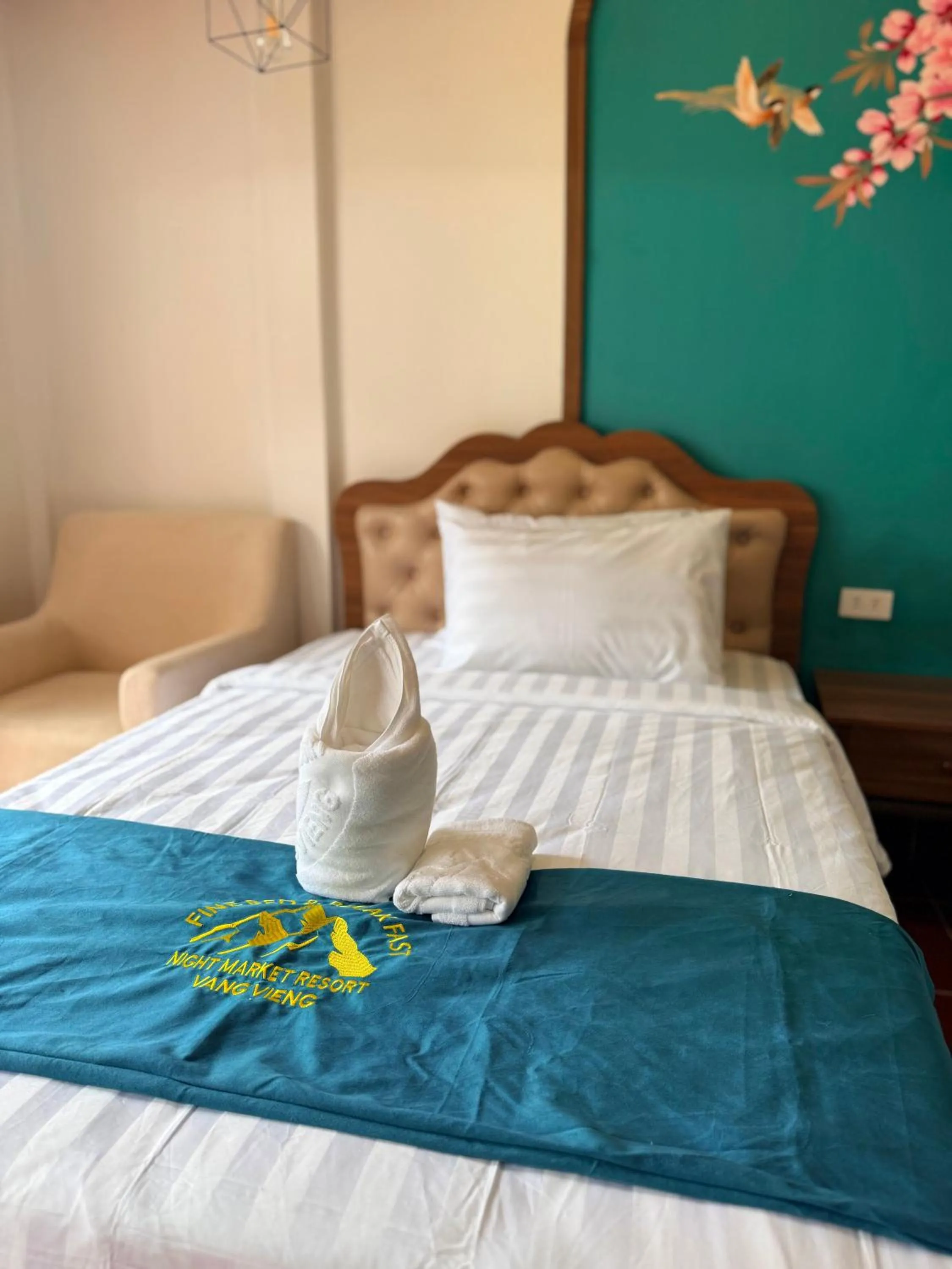 Bed in Vangvieng Night Market Resort