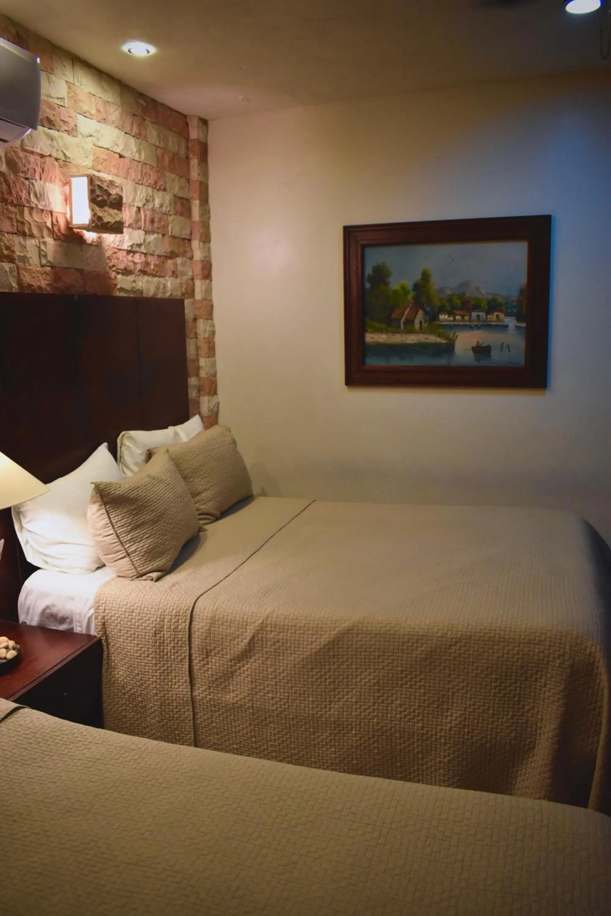 Bed in El Zaguán Colonial by GuruHotel