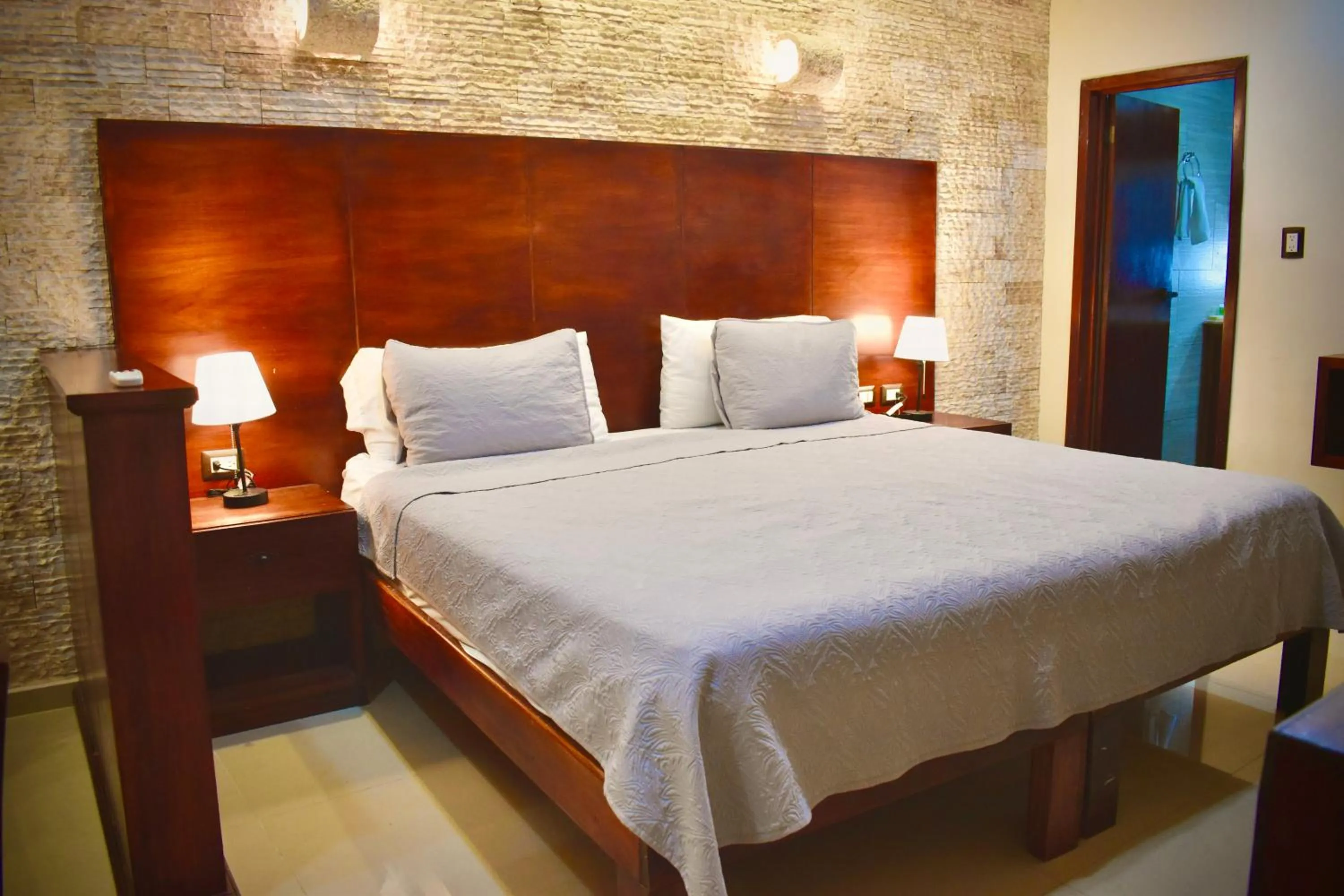 Bed in El Zaguán Colonial by GuruHotel