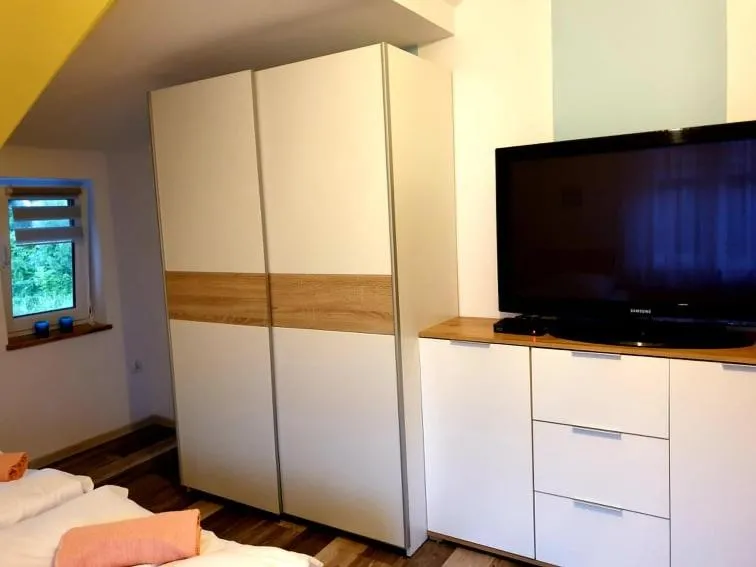 Communal lounge/ TV room, Bed in B&B Villa Varmia