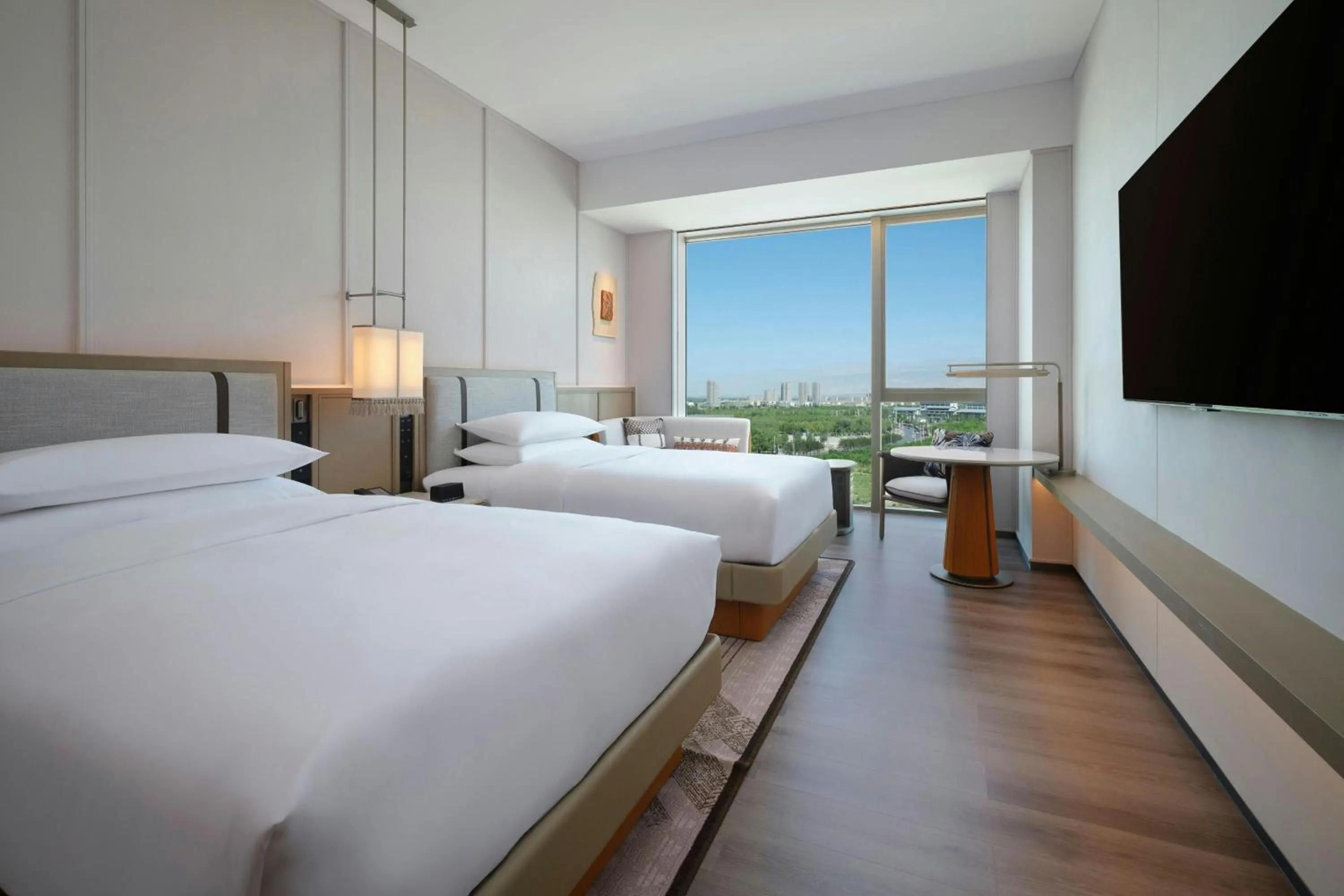 Photo of the whole room, Bed in 库尔勒绿发万怡酒店