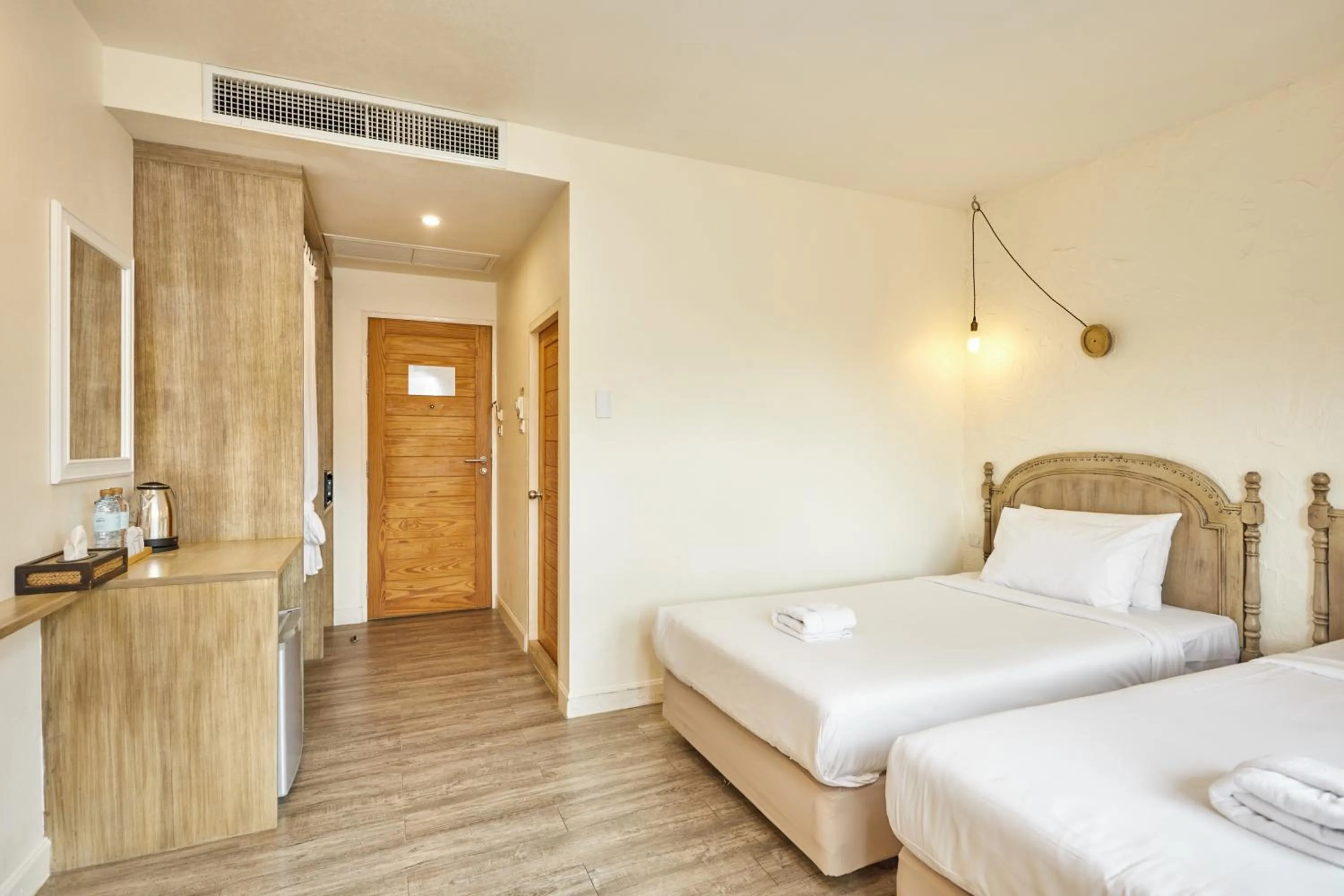 Bed in Talay Hotel and Villa Cha-am