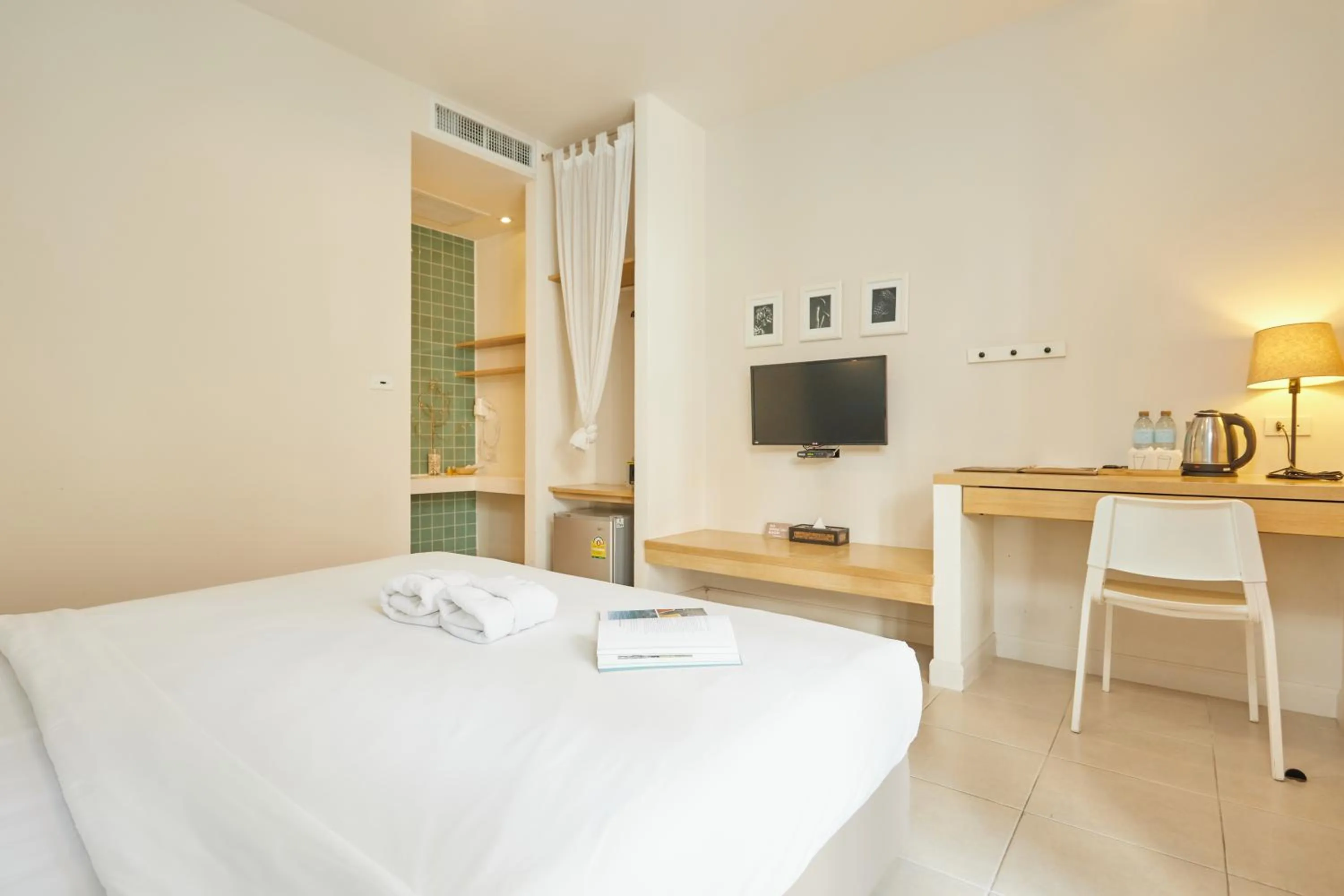 Bed in Talay Hotel and Villa Cha-am