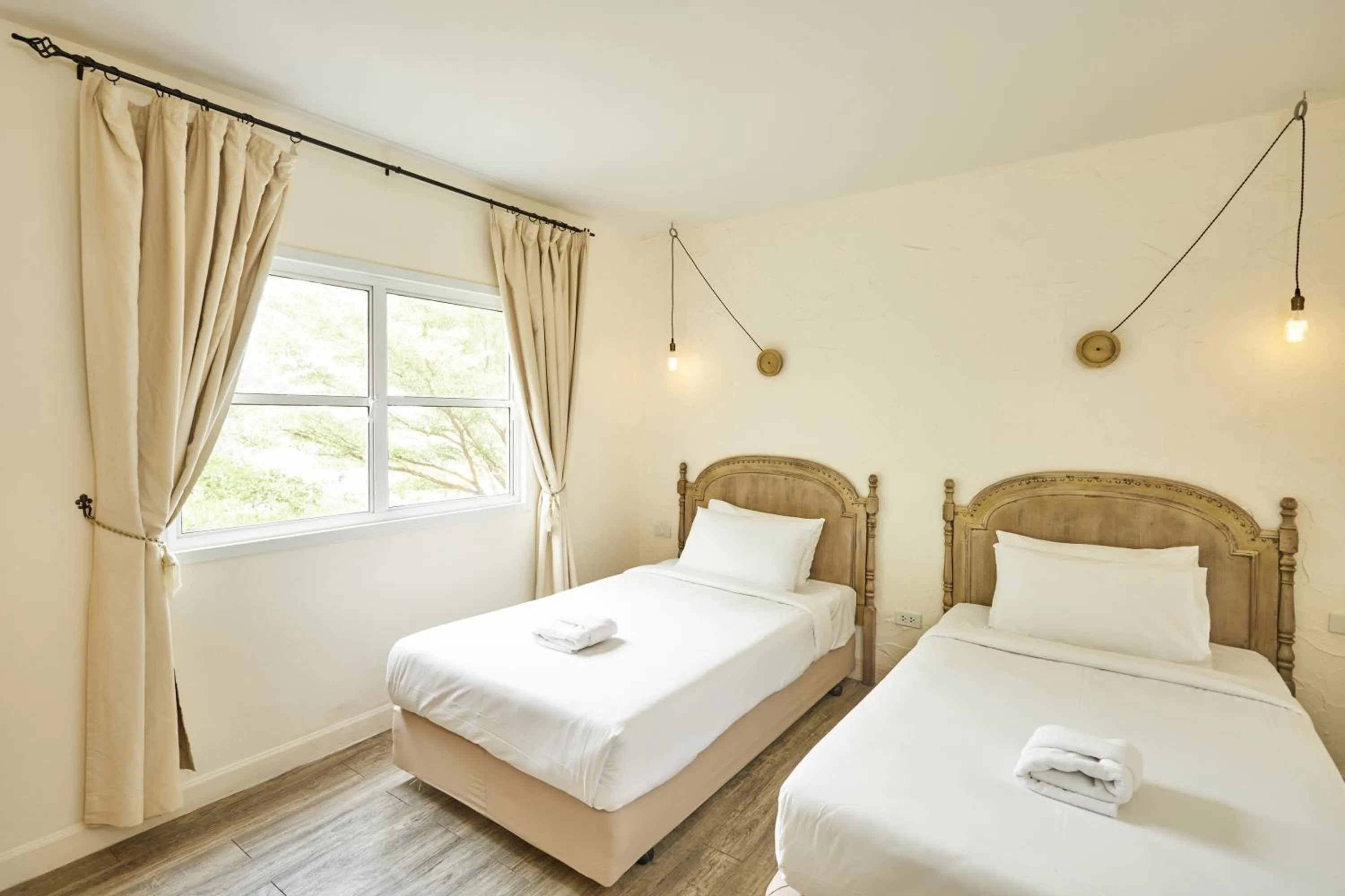 Bed in Talay Hotel and Villa Cha-am