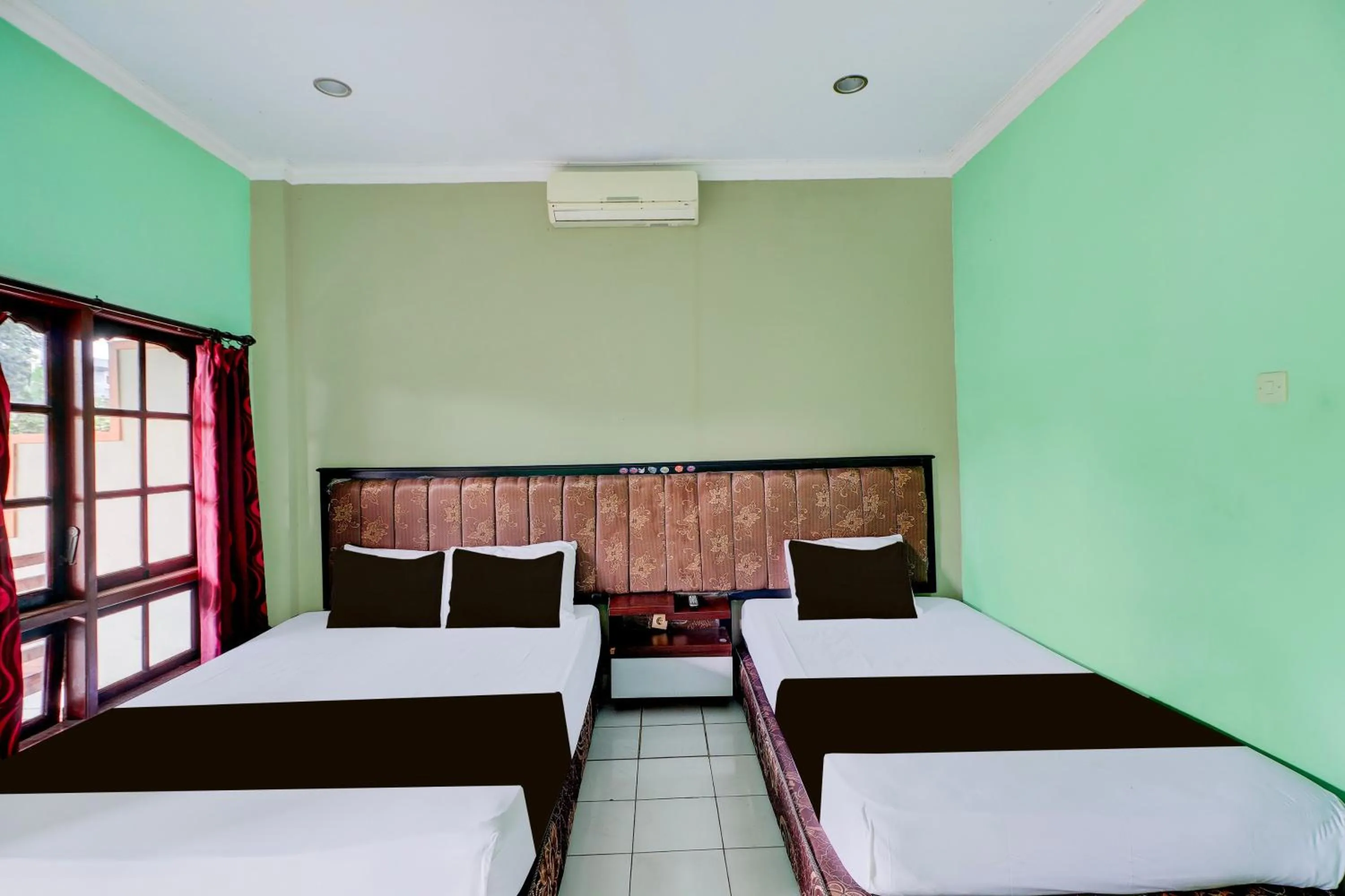 Bedroom, Bed in Collection O Bali near Terminal Ubung formerly Batukaru Garden Hotel