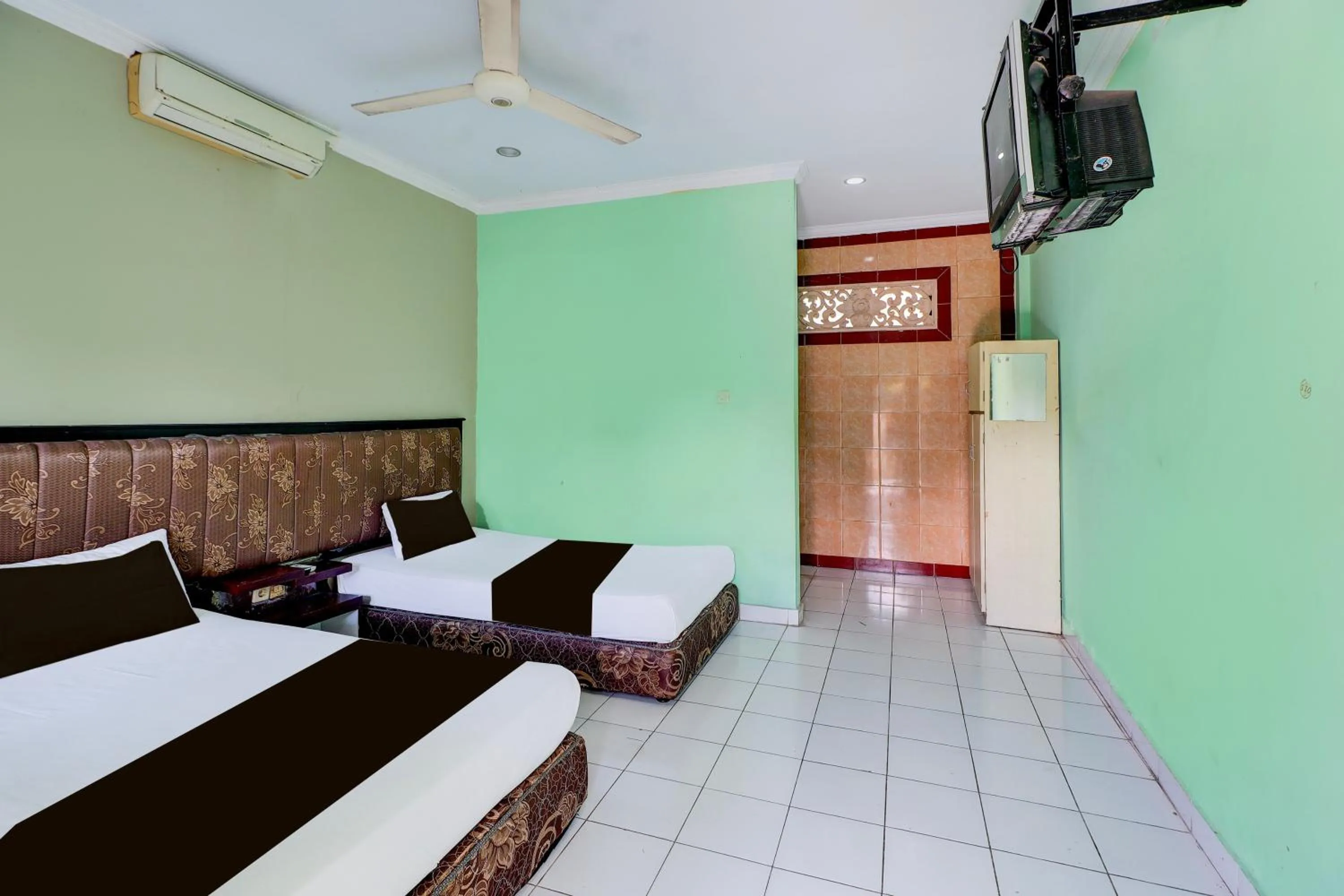 Bedroom, Bed in Collection O Bali near Terminal Ubung formerly Batukaru Garden Hotel