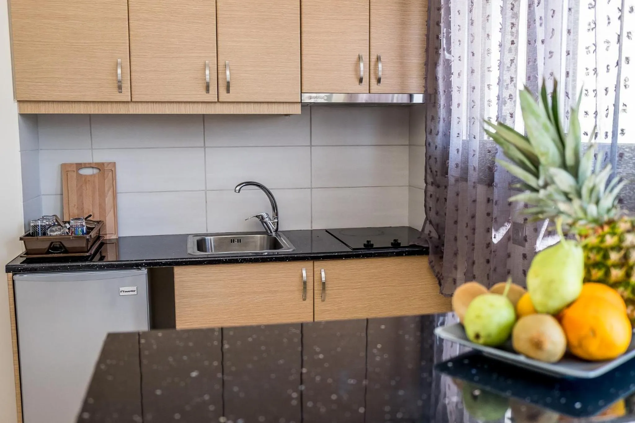 Kitchen or kitchenette in Golden Sun Villas