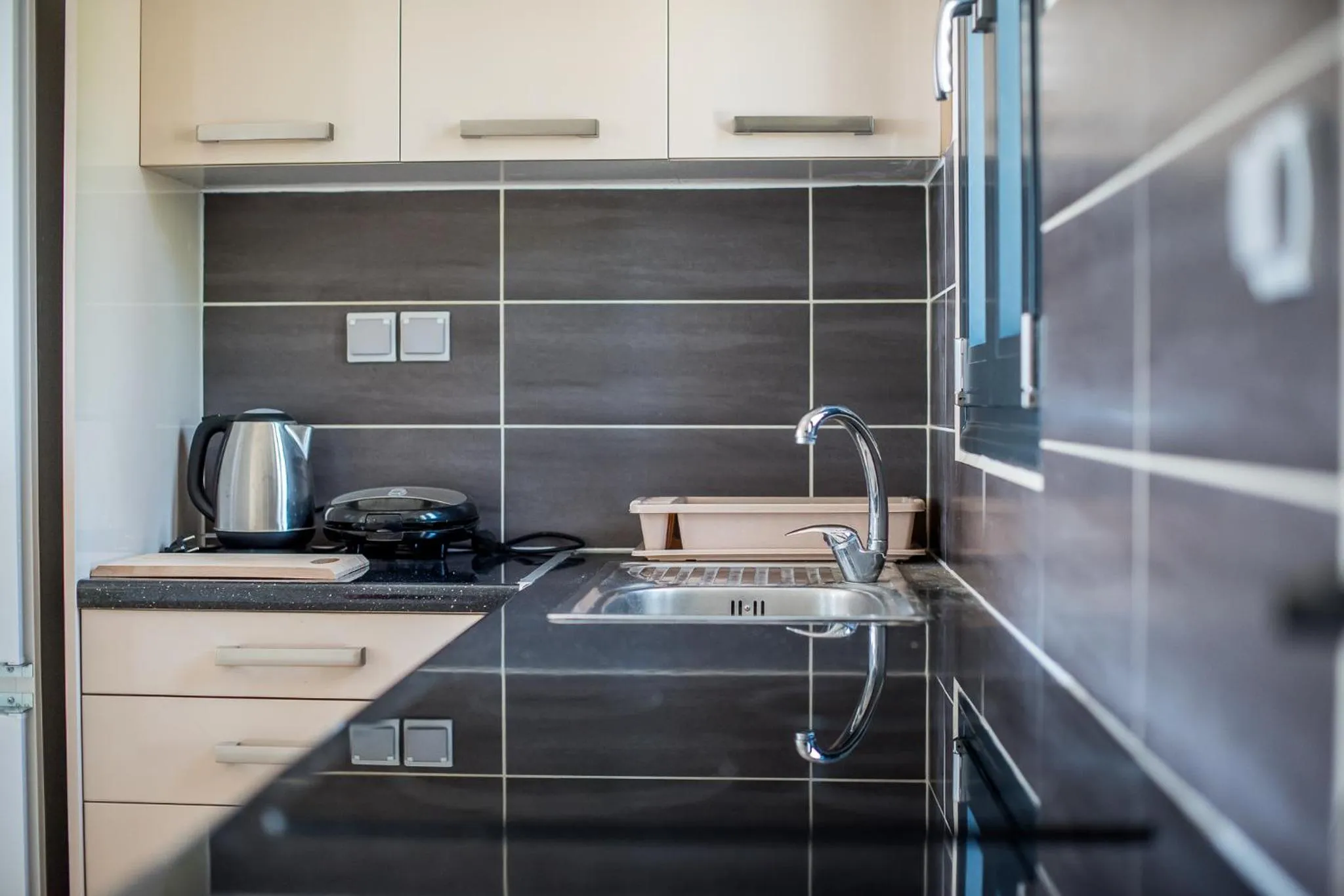 Kitchen or kitchenette in Golden Sun Villas