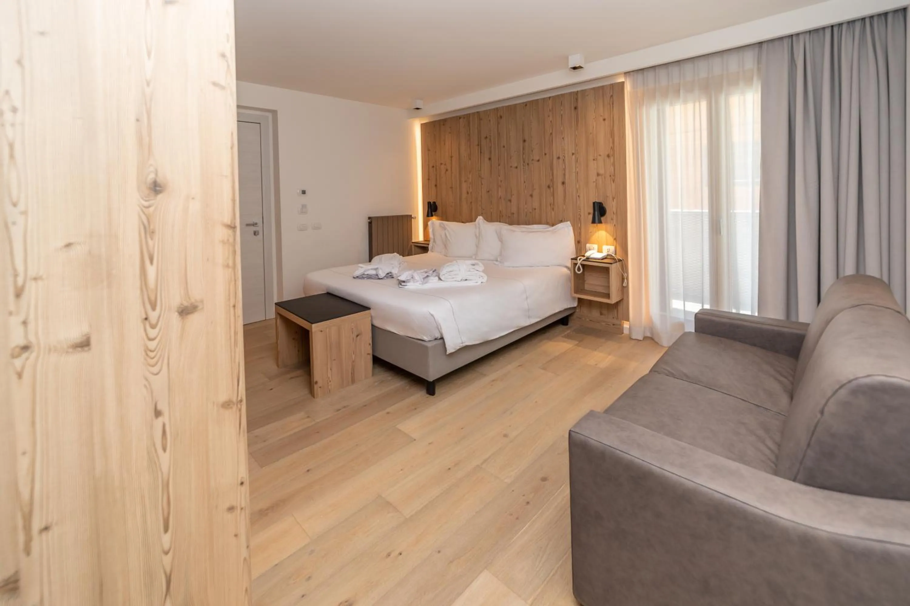 Bed in White Angel Hotel