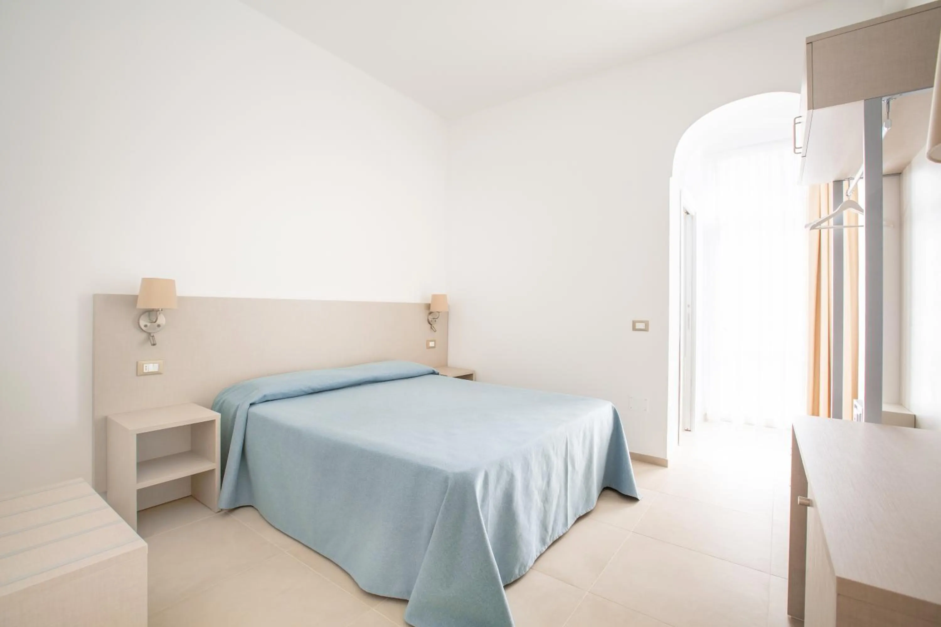 Bed in Hotel Falcone