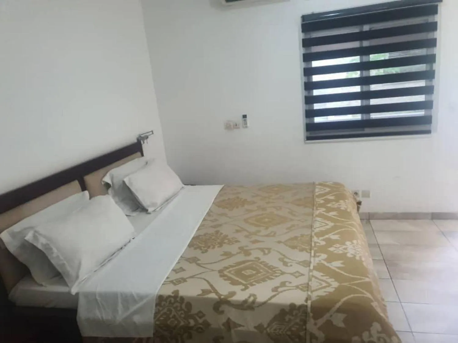 Bed in Hotel Carmel Cocody