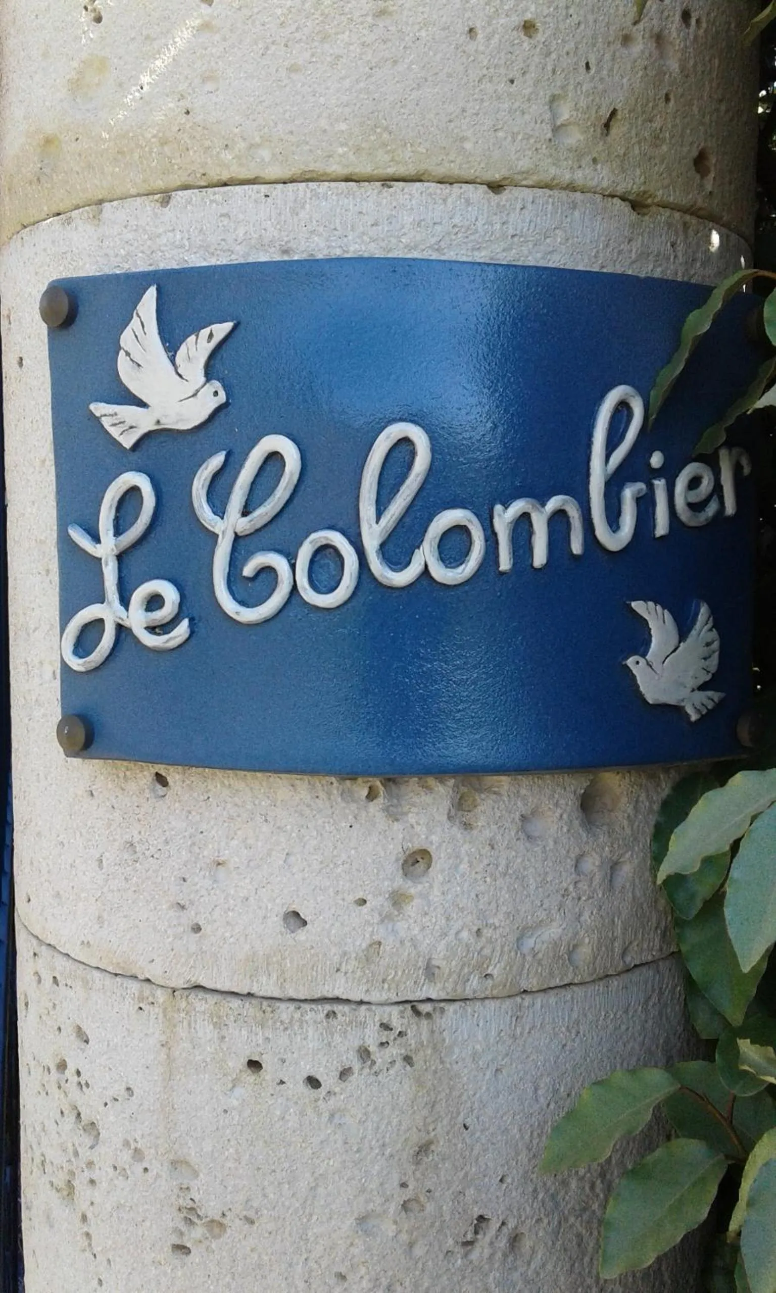 Property logo or sign in Le Colombier