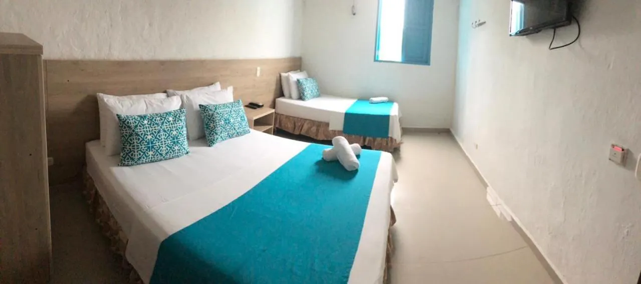 Bed in Hotel Aldea Plaza