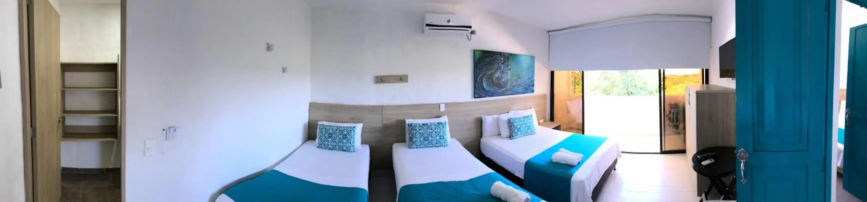 Quadruple Room in Hotel Aldea Plaza Quadruple Room in Hotel Aldea Plaza
