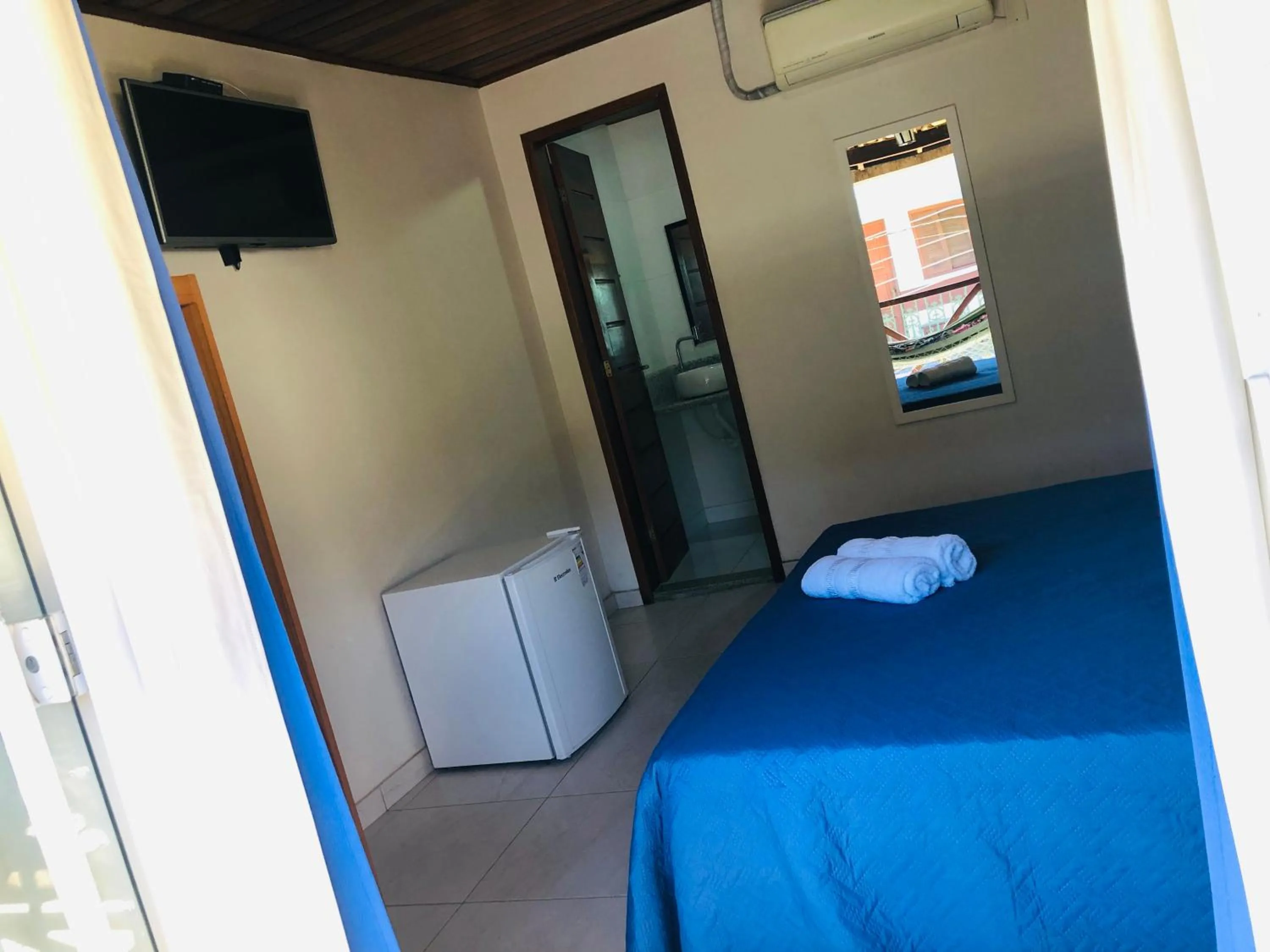Bedroom, Bed in Porto do Sol Suítes