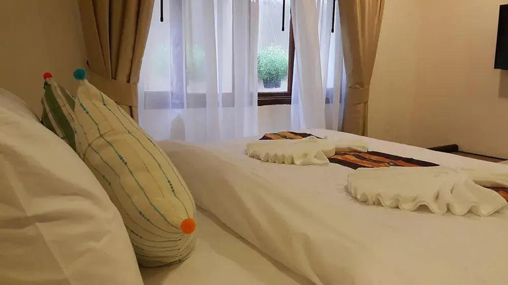 Bed in Rustic River Boutique Bed in Rustic River Boutique