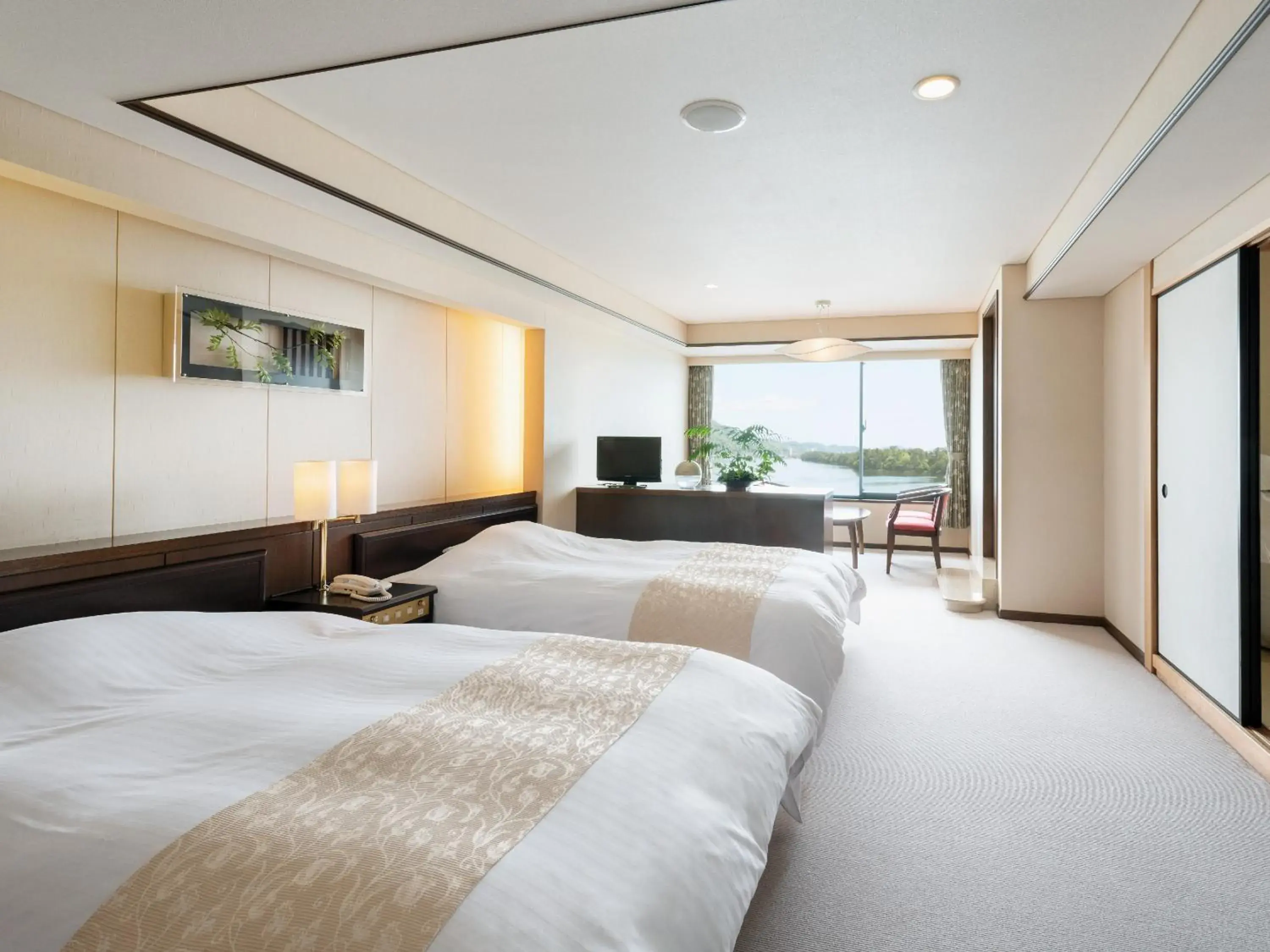 Photo of the whole room, Bed in Amano Hashidate Hotel Photo of the whole room, Bed in Amano Hashidate Hotel